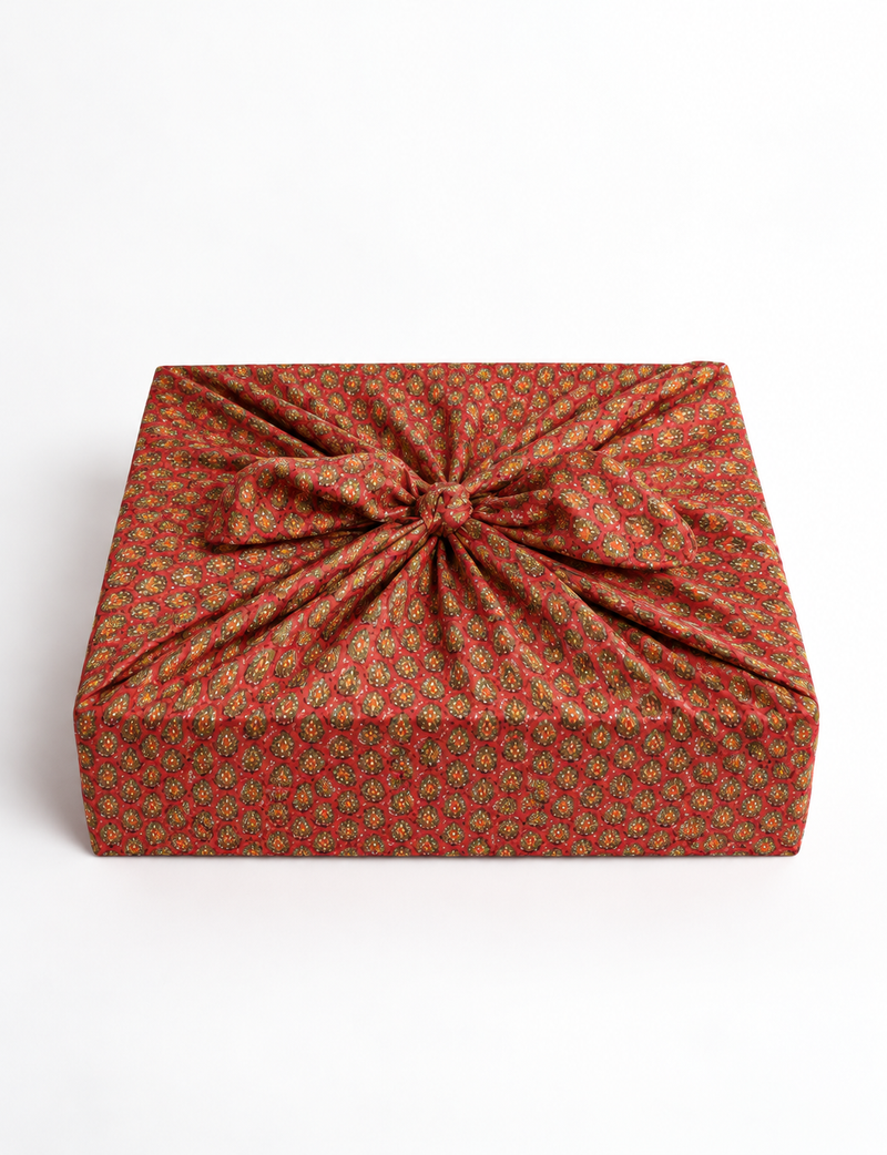 A delicately handcrafted wrap made from recycled sari offcuts, blending sustainable fashion with conscious design. This eco-friendly product showcases the beauty of upcycling and green fashion, making it a perfect accessory for those supporting circular fashion and products made from textile waste.