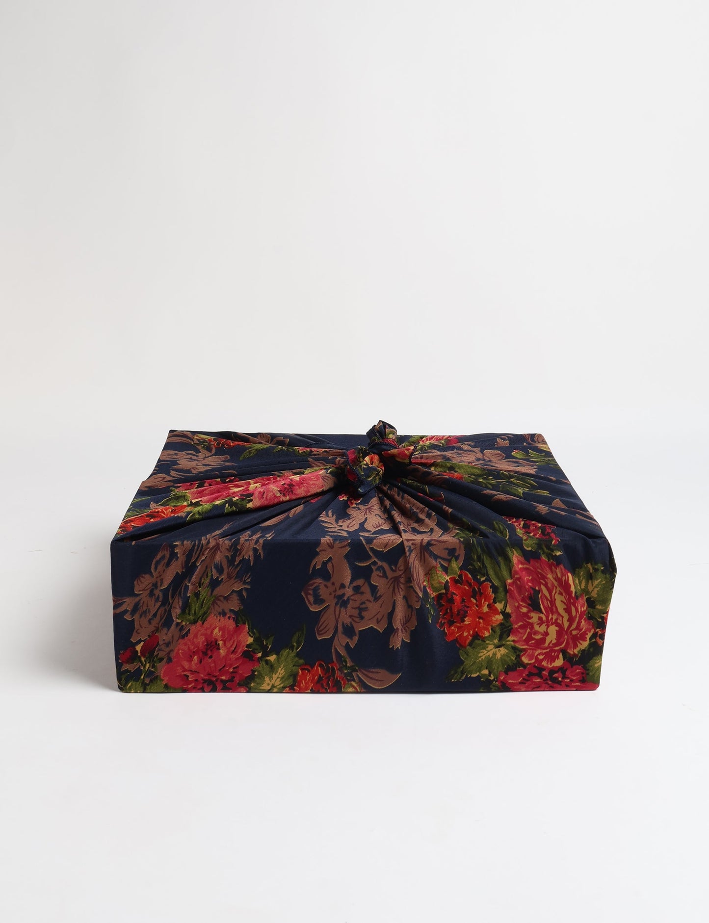 A delicately handcrafted wrap made from recycled sari offcuts, blending sustainable fashion with conscious design. This eco-friendly product showcases the beauty of upcycling and green fashion, making it a perfect accessory for those supporting circular fashion and products made from textile waste.