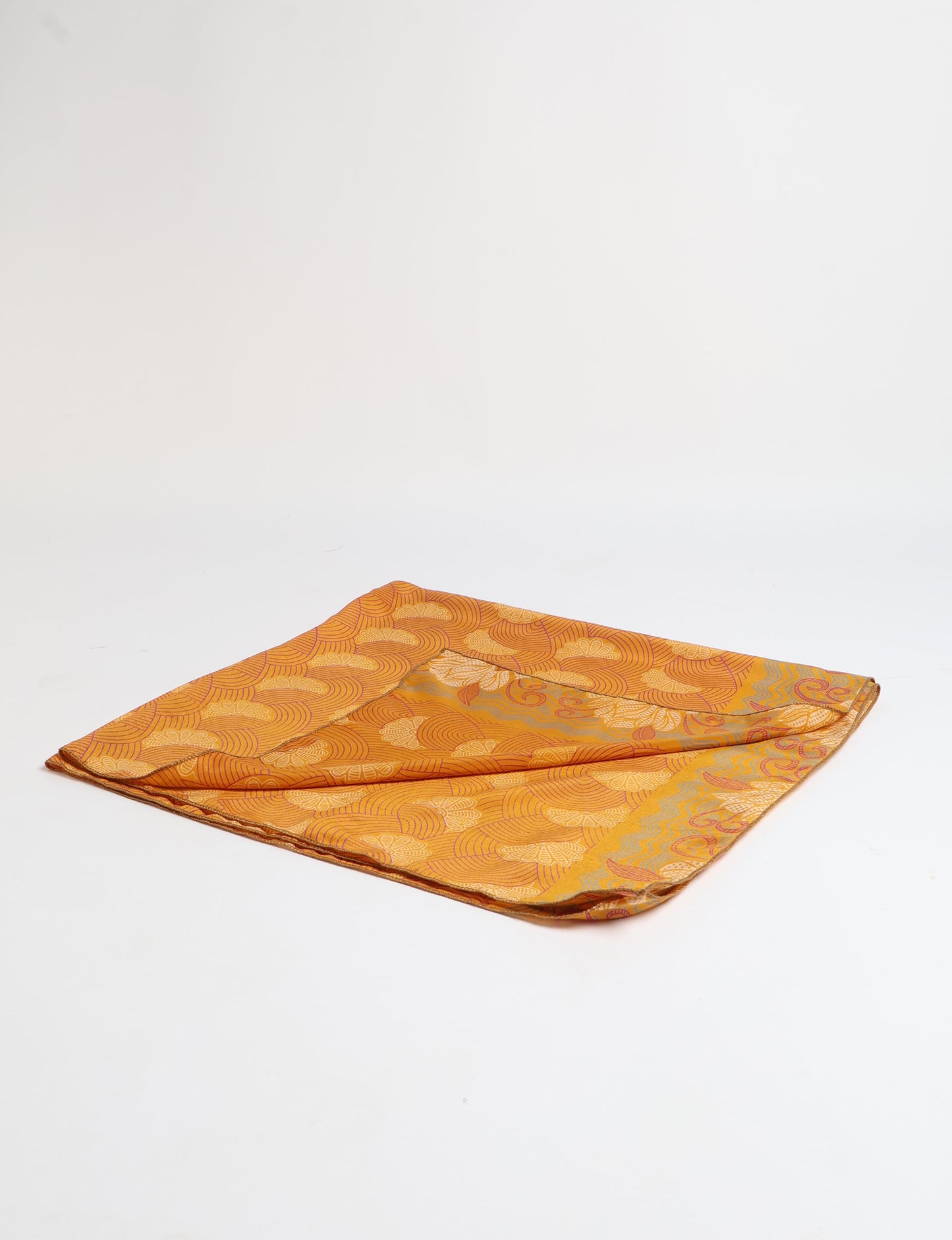 A delicately handcrafted wrap made from recycled sari offcuts, blending sustainable fashion with conscious design. This eco-friendly product showcases the beauty of upcycling and green fashion, making it a perfect accessory for those supporting circular fashion and products made from textile waste.