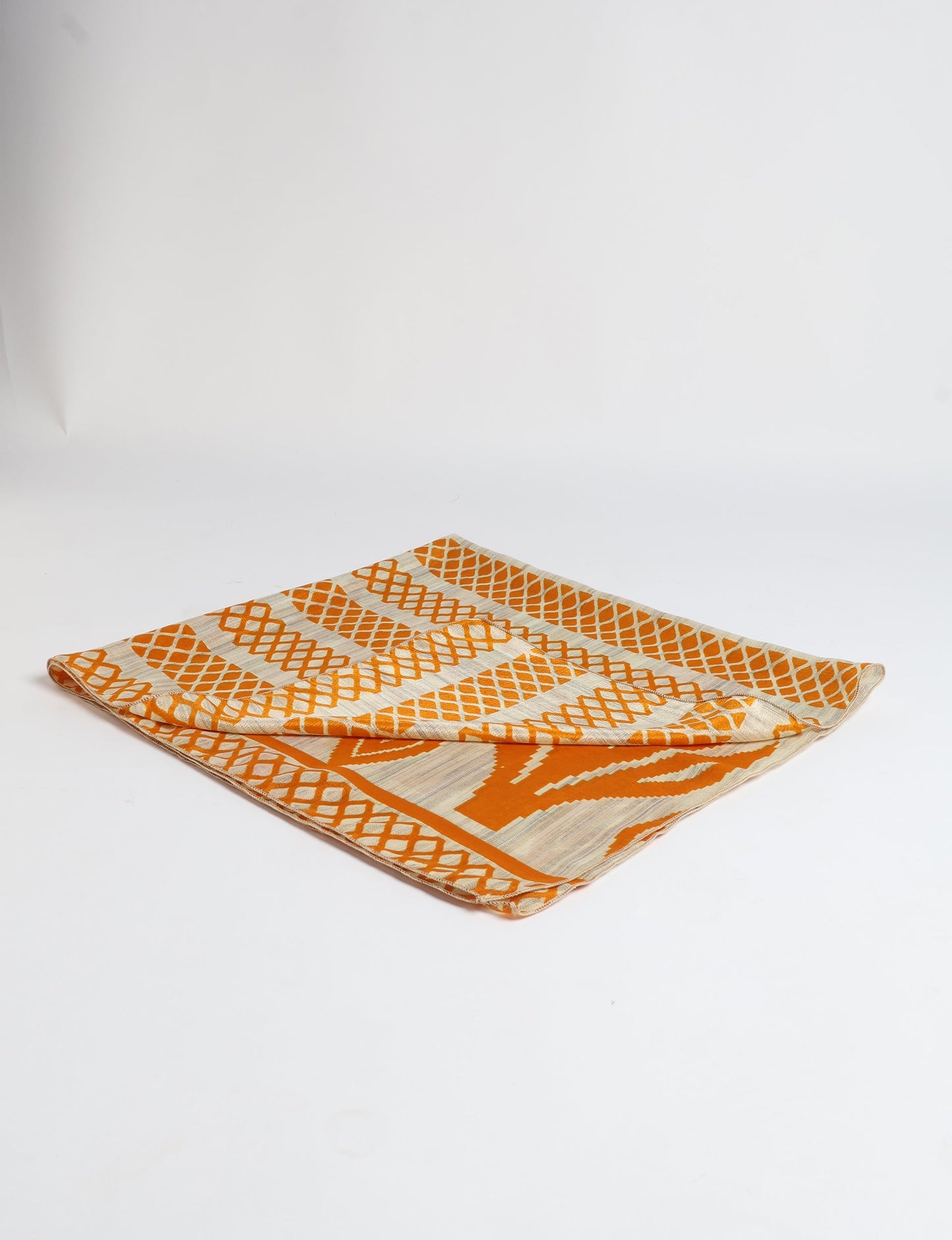 A delicately handcrafted wrap made from recycled sari offcuts, blending sustainable fashion with conscious design. This eco-friendly product showcases the beauty of upcycling and green fashion, making it a perfect accessory for those supporting circular fashion and products made from textile waste.