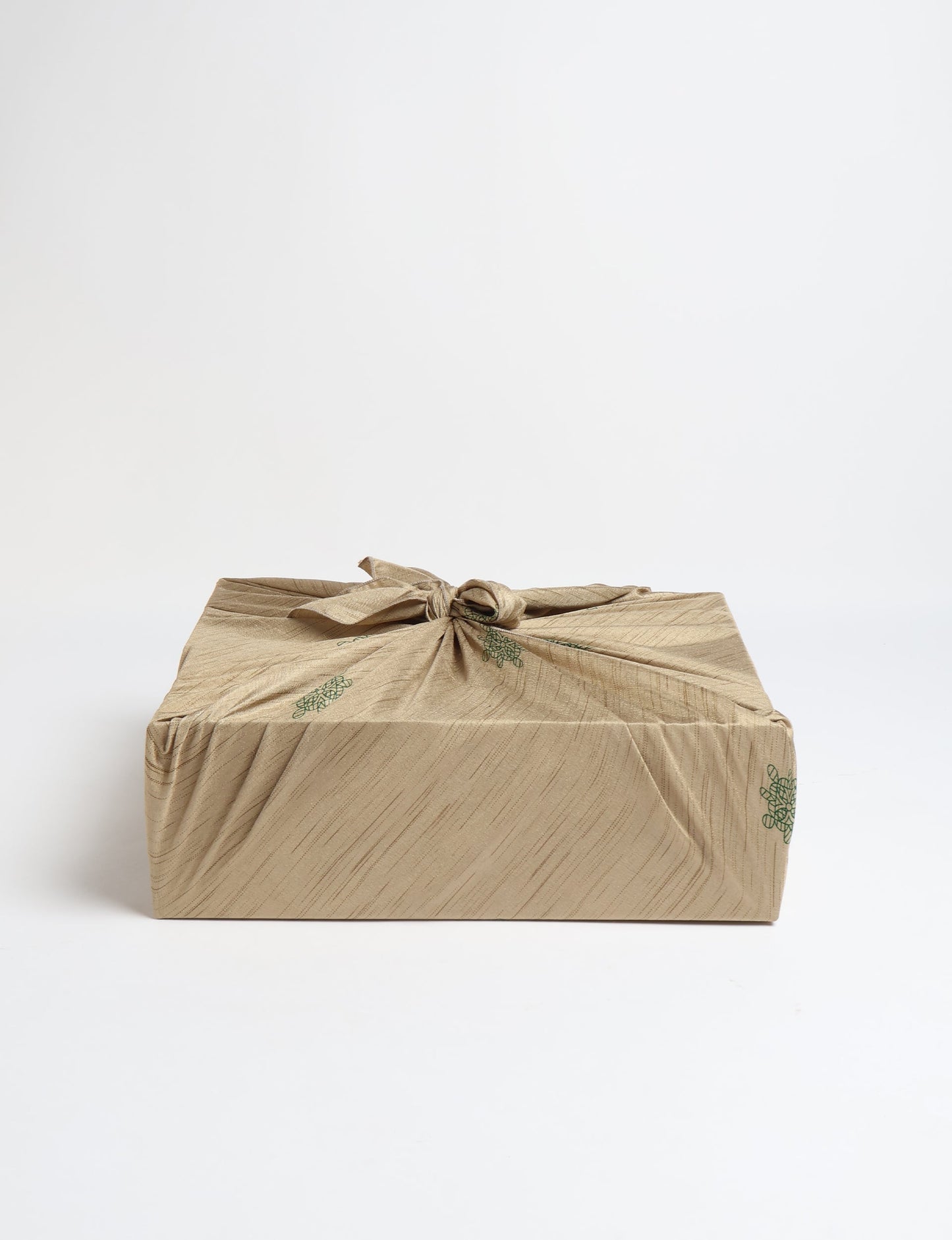 A delicately handcrafted wrap made from recycled sari offcuts, blending sustainable fashion with conscious design. This eco-friendly product showcases the beauty of upcycling and green fashion, making it a perfect accessory for those supporting circular fashion and products made from textile waste.