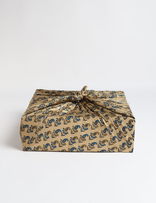 A delicately handcrafted wrap made from recycled sari offcuts, blending sustainable fashion with conscious design. This eco-friendly product showcases the beauty of upcycling and green fashion, making it a perfect accessory for those supporting circular fashion and products made from textile waste.