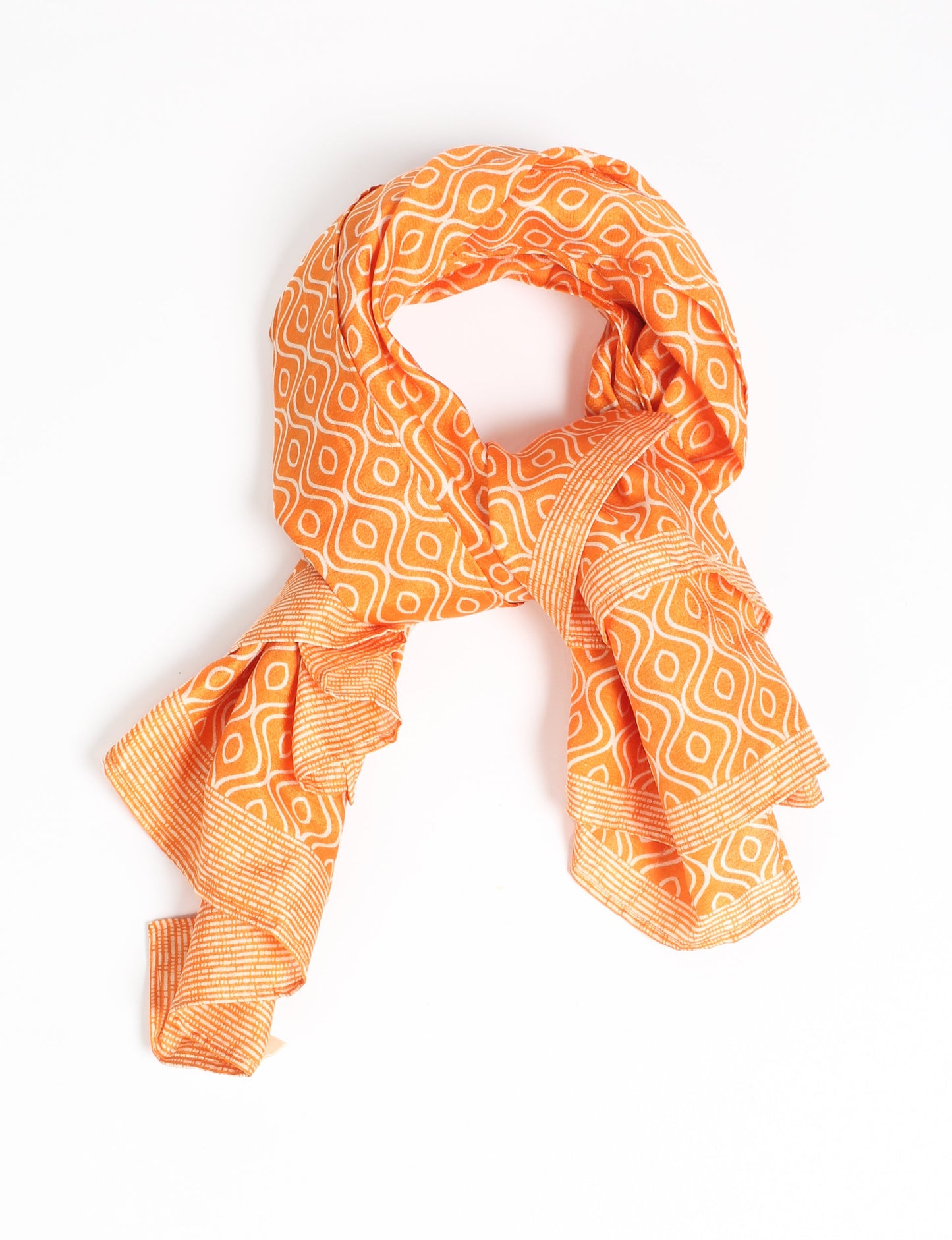 Chic and eco-friendly FOULARD square scarves, perfect for dressing up any outfit. Versatile styling around the head or neck for sunny days outdoors and evenings indoors, in warm and cooler climes. Ethical, eco-friendly, and stylish accessories to elevate your sustainable fashion game.