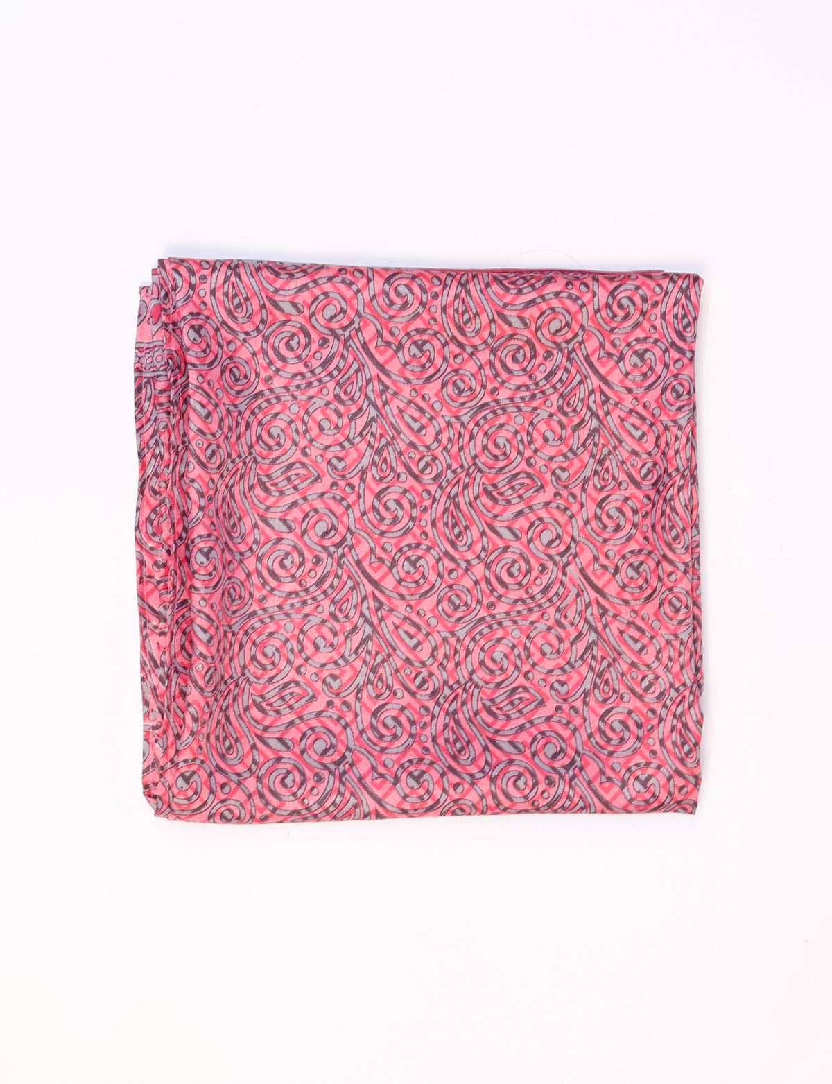 Folded pink foulard with black swirling paisley and dot pattern on a white background
