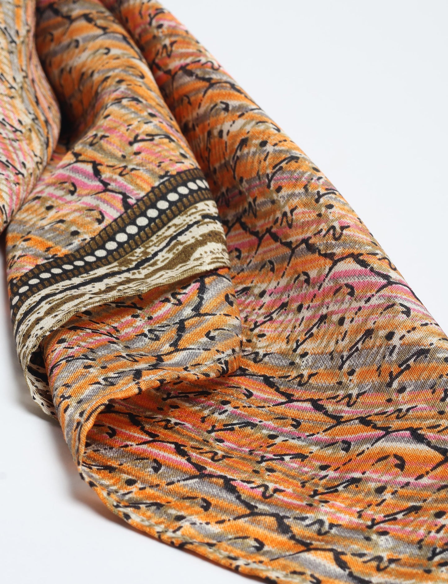 Chic and eco-friendly FOULARD square scarves, perfect for dressing up any outfit. Versatile styling around the head or neck for sunny days outdoors and evenings indoors, in warm and cooler climes. Ethical, eco-friendly, and stylish accessories to elevate your sustainable fashion game.