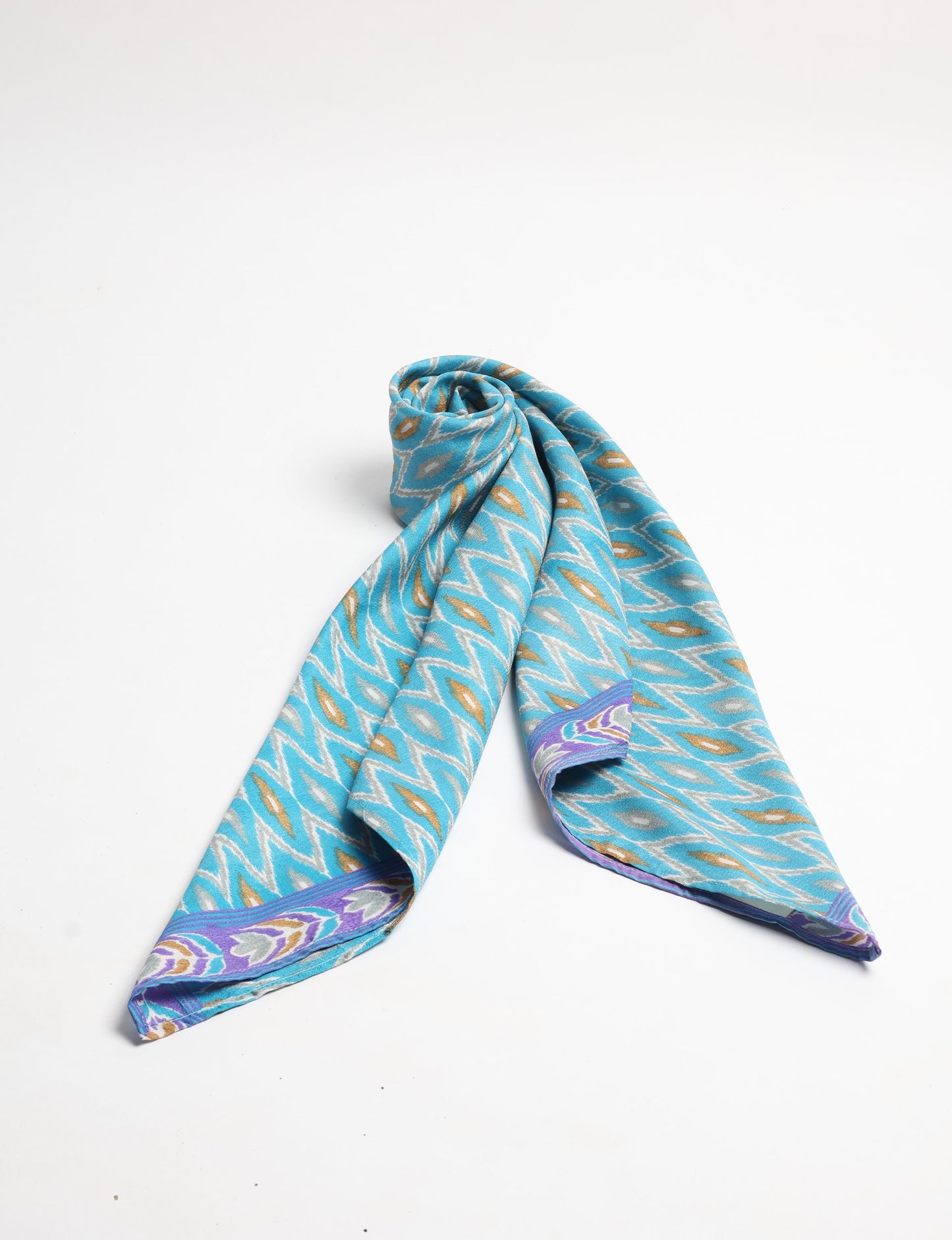Chic and eco-friendly FOULARD square scarves, perfect for dressing up any outfit. Versatile styling around the head or neck for sunny days outdoors and evenings indoors, in warm and cooler climes. Ethical, eco-friendly, and stylish accessories to elevate your sustainable fashion game.