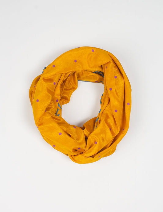 Sustainable style embraces you with our LOOP SCARF – an infinity-style scarf crafted from vibrant, pattern-rich saris. Handcrafted by experienced Mumbai-based artisans, this versatile scarf can be worn looped once or twice around your neck or as a head-wrap. From laid-back beach vacations to dress-to-impress dinners, this scarf is a timeless accessory.