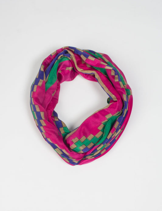 Sustainable style embraces you with our LOOP SCARF – an infinity-style scarf crafted from vibrant, pattern-rich saris. Handcrafted by experienced Mumbai-based artisans, this versatile scarf can be worn looped once or twice around your neck or as a head-wrap. From laid-back beach vacations to dress-to-impress dinners, this scarf is a timeless accessory.