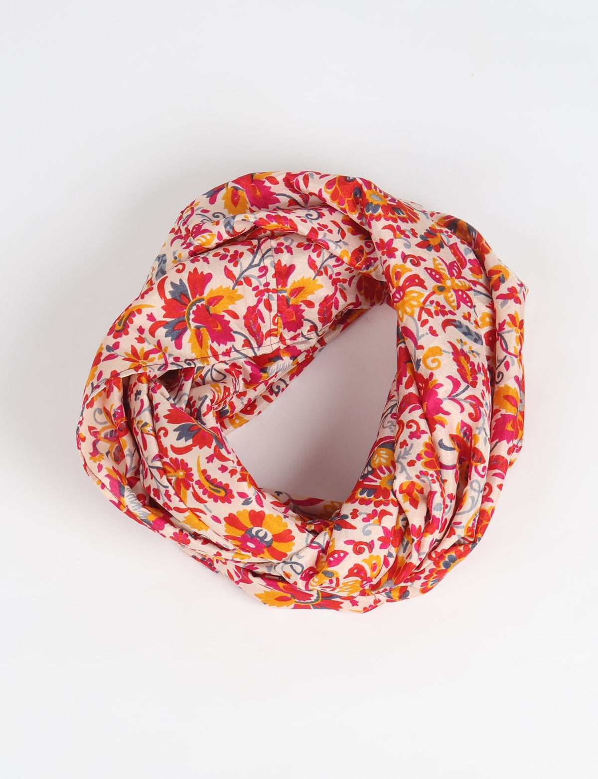 Sustainable style embraces you with our LOOP SCARF – an infinity-style scarf crafted from vibrant, pattern-rich saris. Handcrafted by experienced Mumbai-based artisans, this versatile scarf can be worn looped once or twice around your neck or as a head-wrap. From laid-back beach vacations to dress-to-impress dinners, this scarf is a timeless accessory.