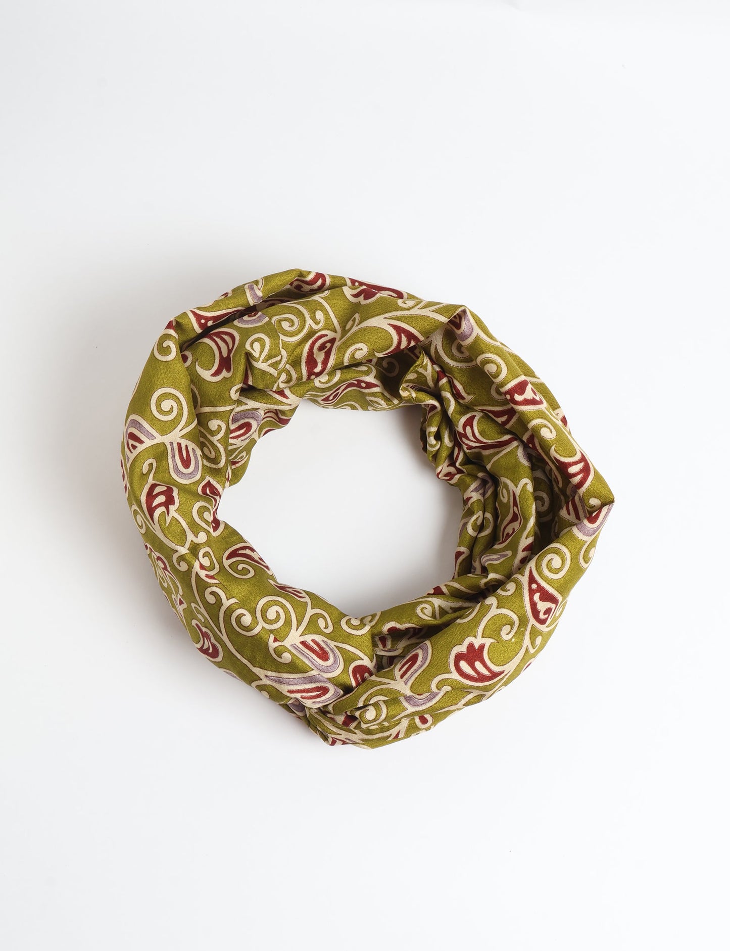 Sustainable style embraces you with our LOOP SCARF – an infinity-style scarf crafted from vibrant, pattern-rich saris. Handcrafted by experienced Mumbai-based artisans, this versatile scarf can be worn looped once or twice around your neck or as a head-wrap. From laid-back beach vacations to dress-to-impress dinners, this scarf is a timeless accessory.