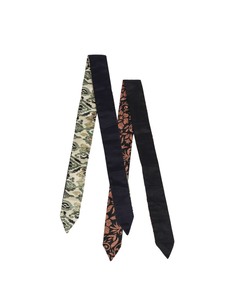 Set of two assorted headbands with black velvet and floral patterned fabric, shown flat on white background