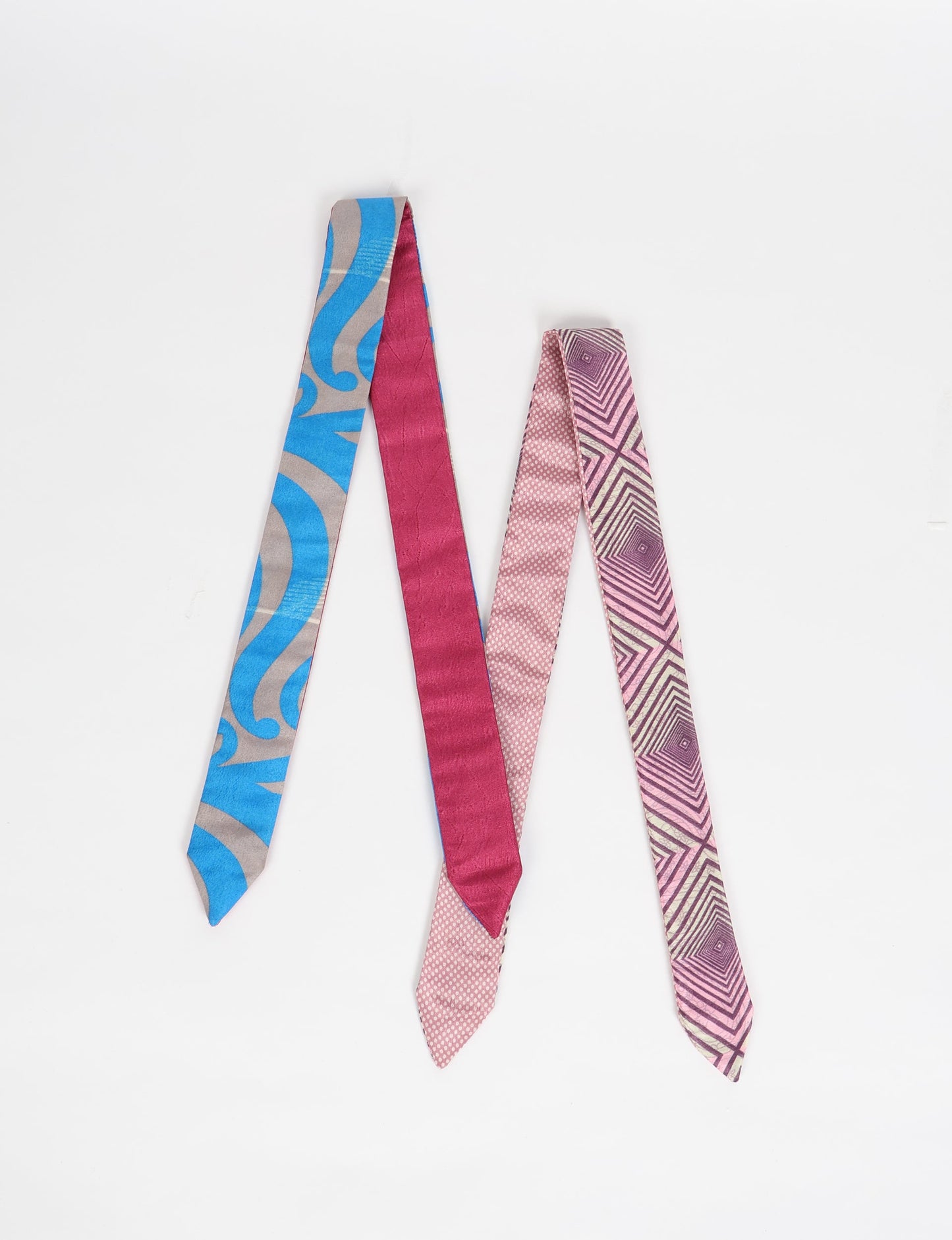 Colorful sustainable headband made from recycled fabric, representing fair trade, circular fashion, and carbon neutral clothing for mindful wardrobes.