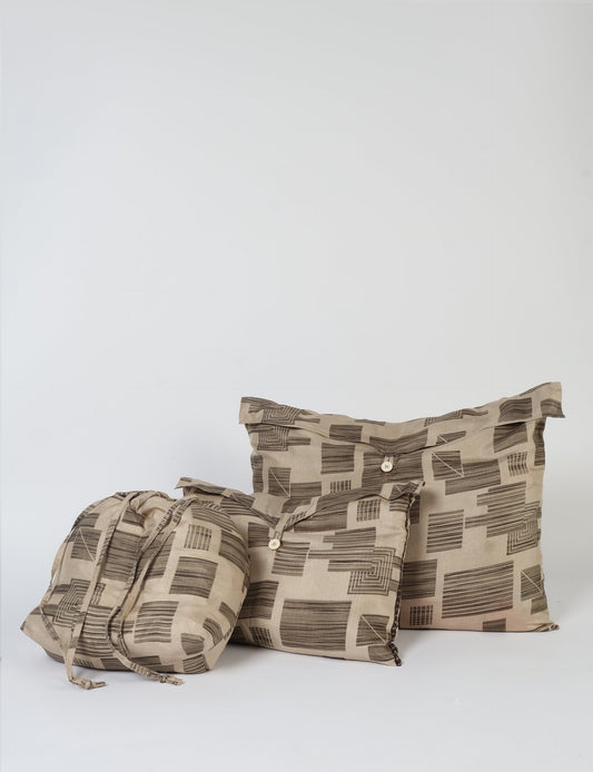 Eco-friendly travel pouch set crafted from upcycled materials. Perfect for organizing tech accessories, chargers, and small items on your sustainable journey.