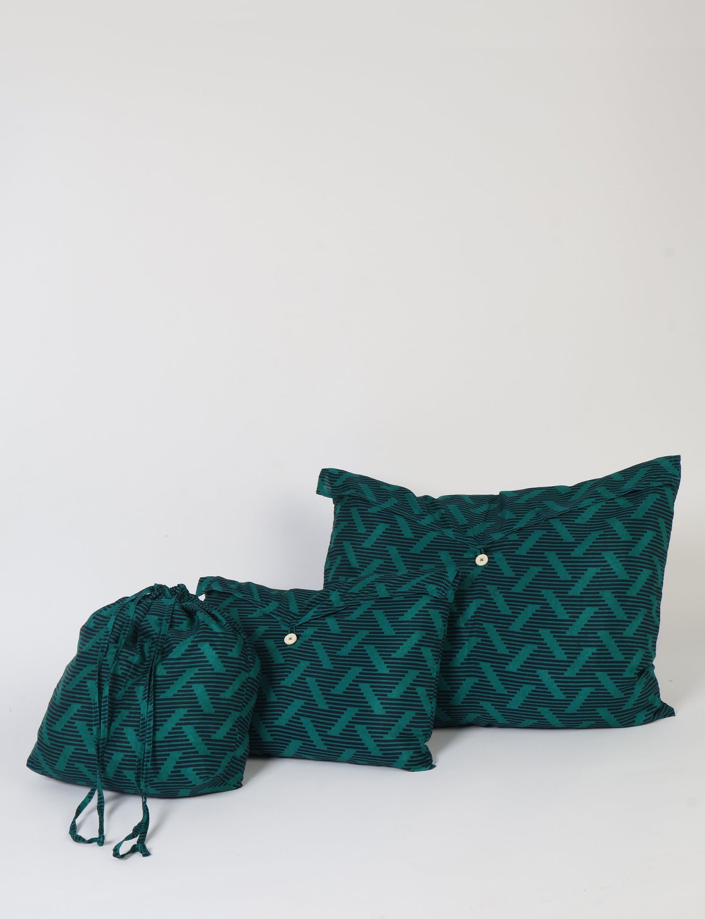 Eco-friendly travel pouch set crafted from upcycled materials. Perfect for organizing tech accessories, chargers, and small items on your sustainable journey.