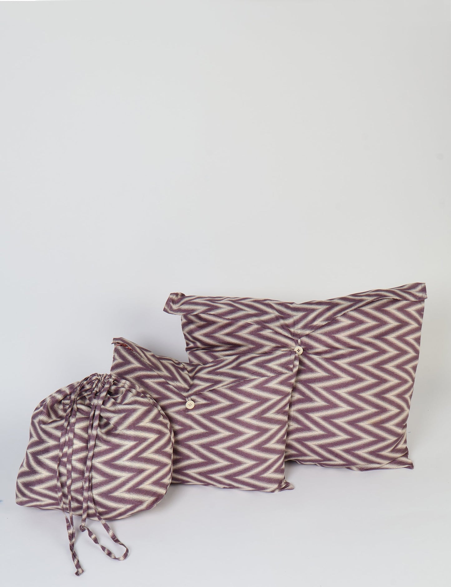 Eco-friendly travel pouch set crafted from upcycled materials. Perfect for organizing tech accessories, chargers, and small items on your sustainable journey.