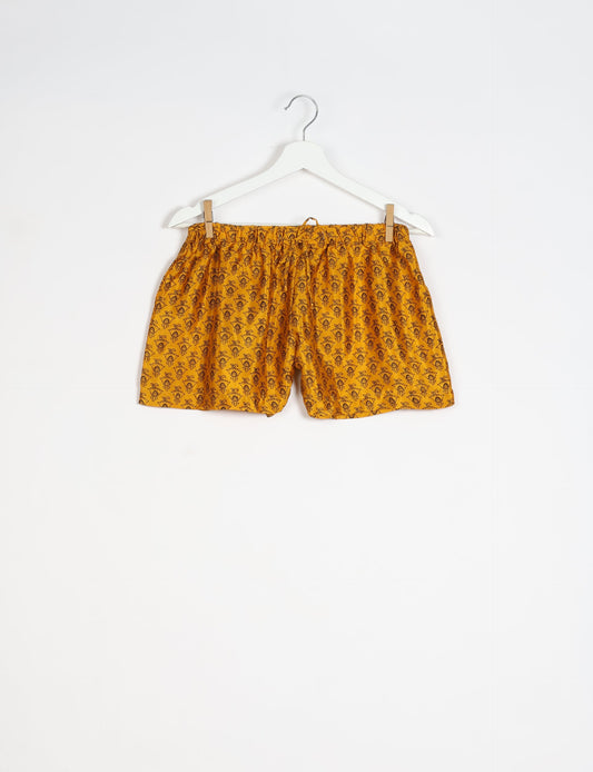 Elevate your wardrobe with our eco-friendly shorts. The all-around elastic waist and drawstring tie provide comfort and style. Crafted with ethical and sustainable practices, these shorts redefine green fashion, making them a perfect addition to your conscious clothing collection.