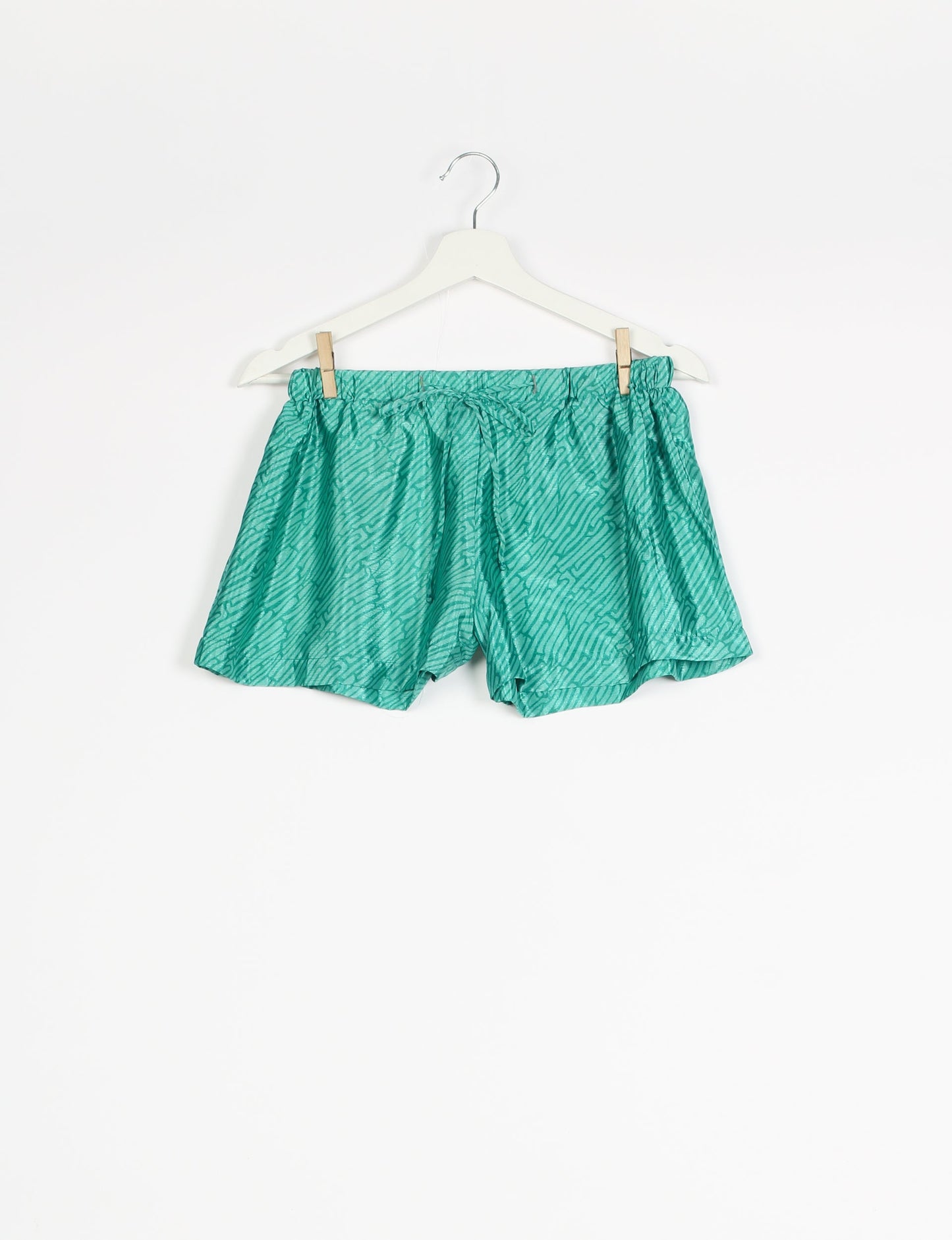 Elevate your wardrobe with our eco-friendly shorts. The all-around elastic waist and drawstring tie provide comfort and style. Crafted with ethical and sustainable practices, these shorts redefine green fashion, making them a perfect addition to your conscious clothing collection.