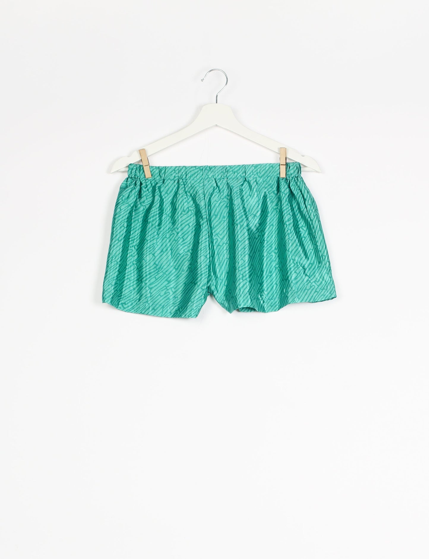 Elevate your wardrobe with our eco-friendly shorts. The all-around elastic waist and drawstring tie provide comfort and style. Crafted with ethical and sustainable practices, these shorts redefine green fashion, making them a perfect addition to your conscious clothing collection.