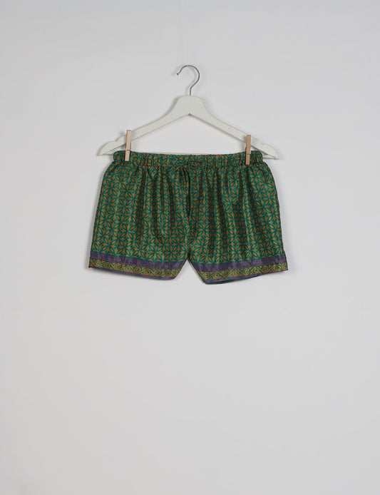 Elevate your wardrobe with our eco-friendly shorts. The all-around elastic waist and drawstring tie provide comfort and style. Crafted with ethical and sustainable practices, these shorts redefine green fashion, making them a perfect addition to your conscious clothing collection.