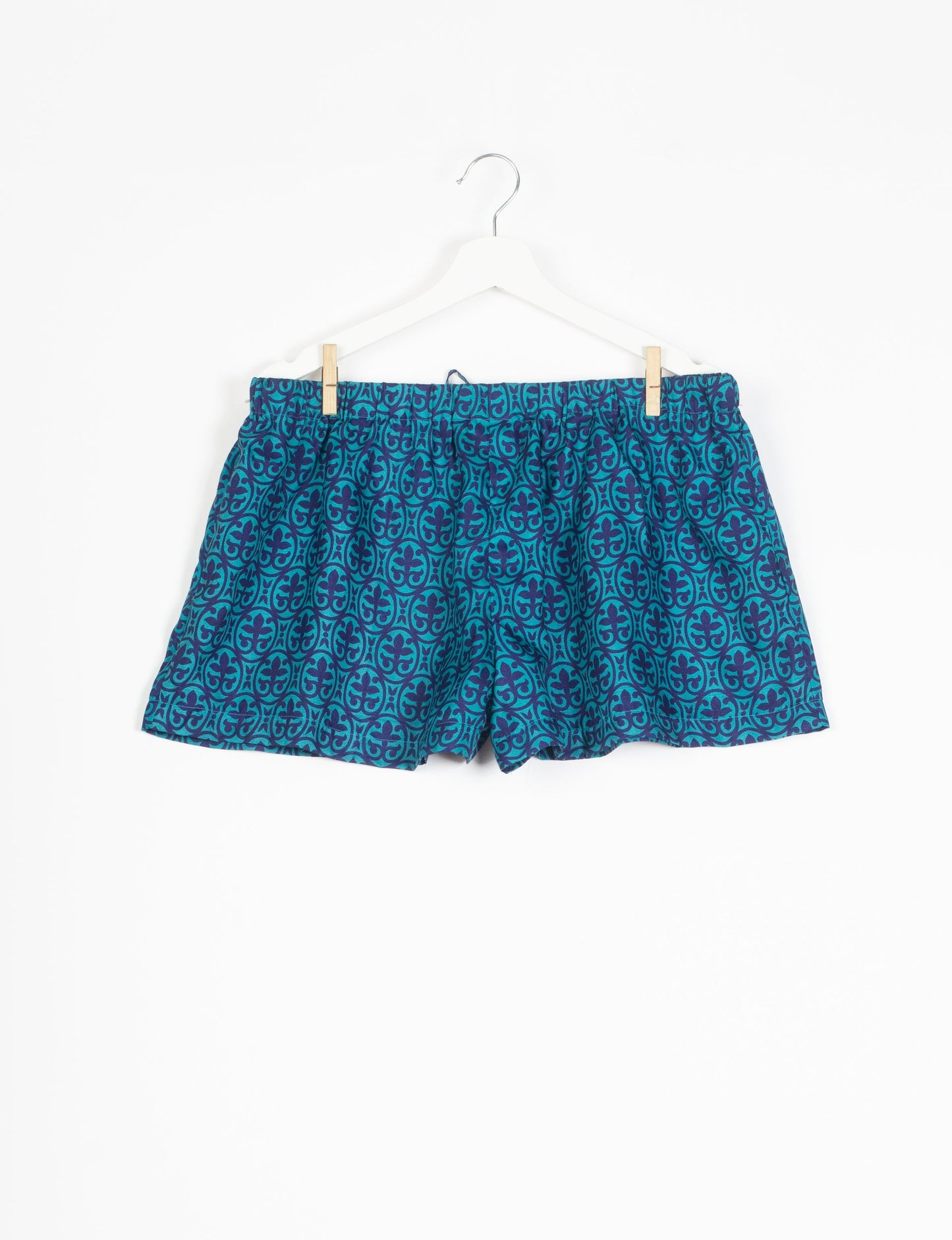 Elevate your wardrobe with our eco-friendly shorts. The all-around elastic waist and drawstring tie provide comfort and style. Crafted with ethical and sustainable practices, these shorts redefine green fashion, making them a perfect addition to your conscious clothing collection.