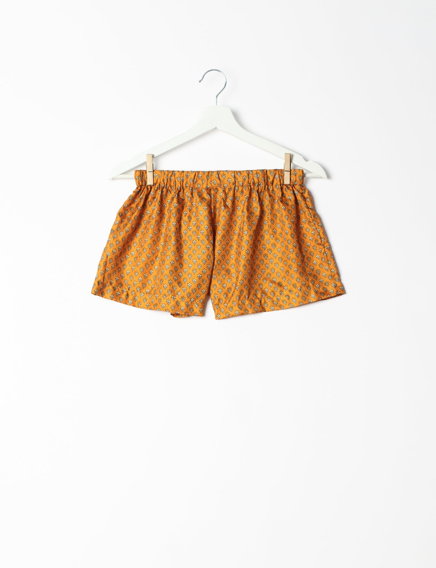 Elevate your wardrobe with our eco-friendly shorts. The all-around elastic waist and drawstring tie provide comfort and style. Crafted with ethical and sustainable practices, these shorts redefine green fashion, making them a perfect addition to your conscious clothing collection.