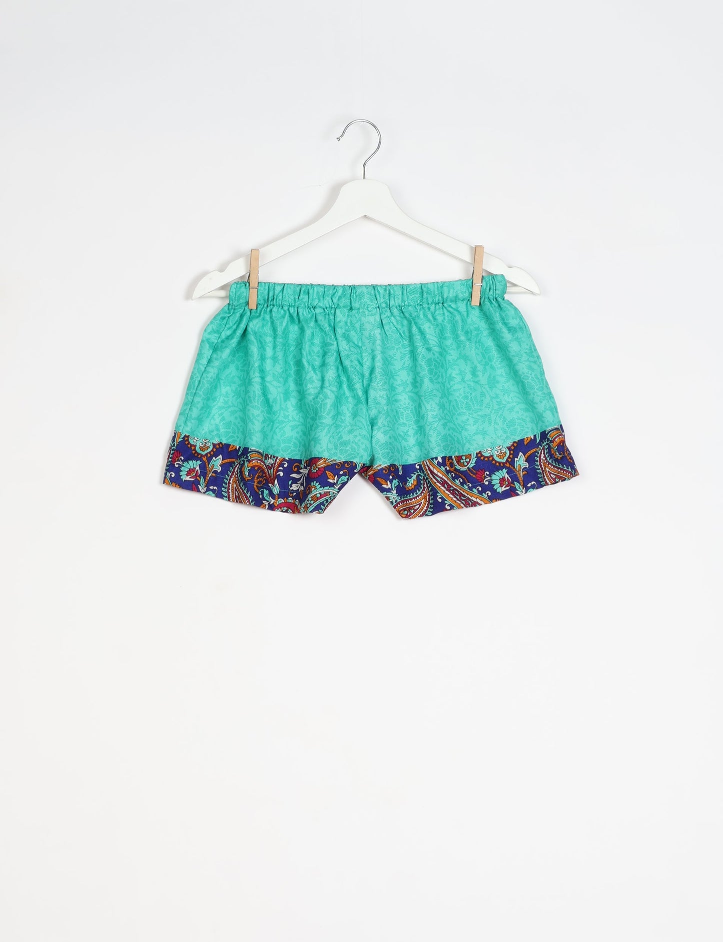 Elevate your wardrobe with our eco-friendly shorts. The all-around elastic waist and drawstring tie provide comfort and style. Crafted with ethical and sustainable practices, these shorts redefine green fashion, making them a perfect addition to your conscious clothing collection.