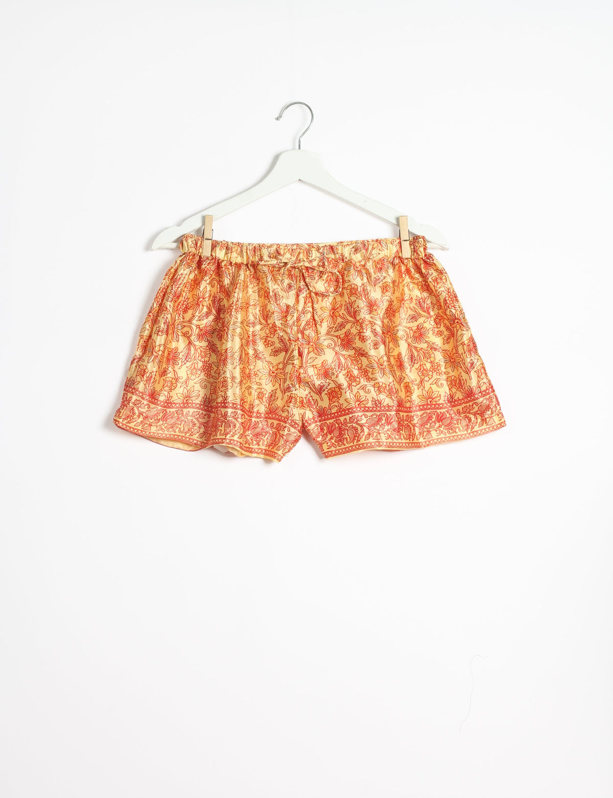 Sleep in eco-friendly luxury with our PJ Set Short. Made for the conscious consumer, these pajamas contribute to zero waste and sustainable practices. The cami top, adorned with delicate eyelash lace and cut on the bias, pairs seamlessly with the comfy shorts featuring an elasticated waist and drawstring tie.