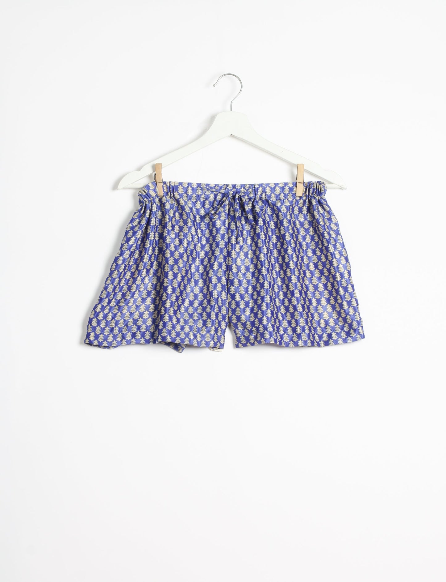 Sleep in eco-friendly luxury with our PJ Set Short. Made for the conscious consumer, these pajamas contribute to zero waste and sustainable practices. The cami top, adorned with delicate eyelash lace and cut on the bias, pairs seamlessly with the comfy shorts featuring an elasticated waist and drawstring tie.