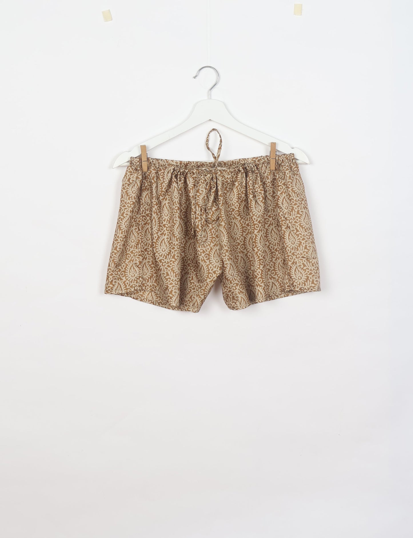 Sleep in eco-friendly luxury with our PJ Set Short. Made for the conscious consumer, these pajamas contribute to zero waste and sustainable practices. The cami top, adorned with delicate eyelash lace and cut on the bias, pairs seamlessly with the comfy shorts featuring an elasticated waist and drawstring tie.