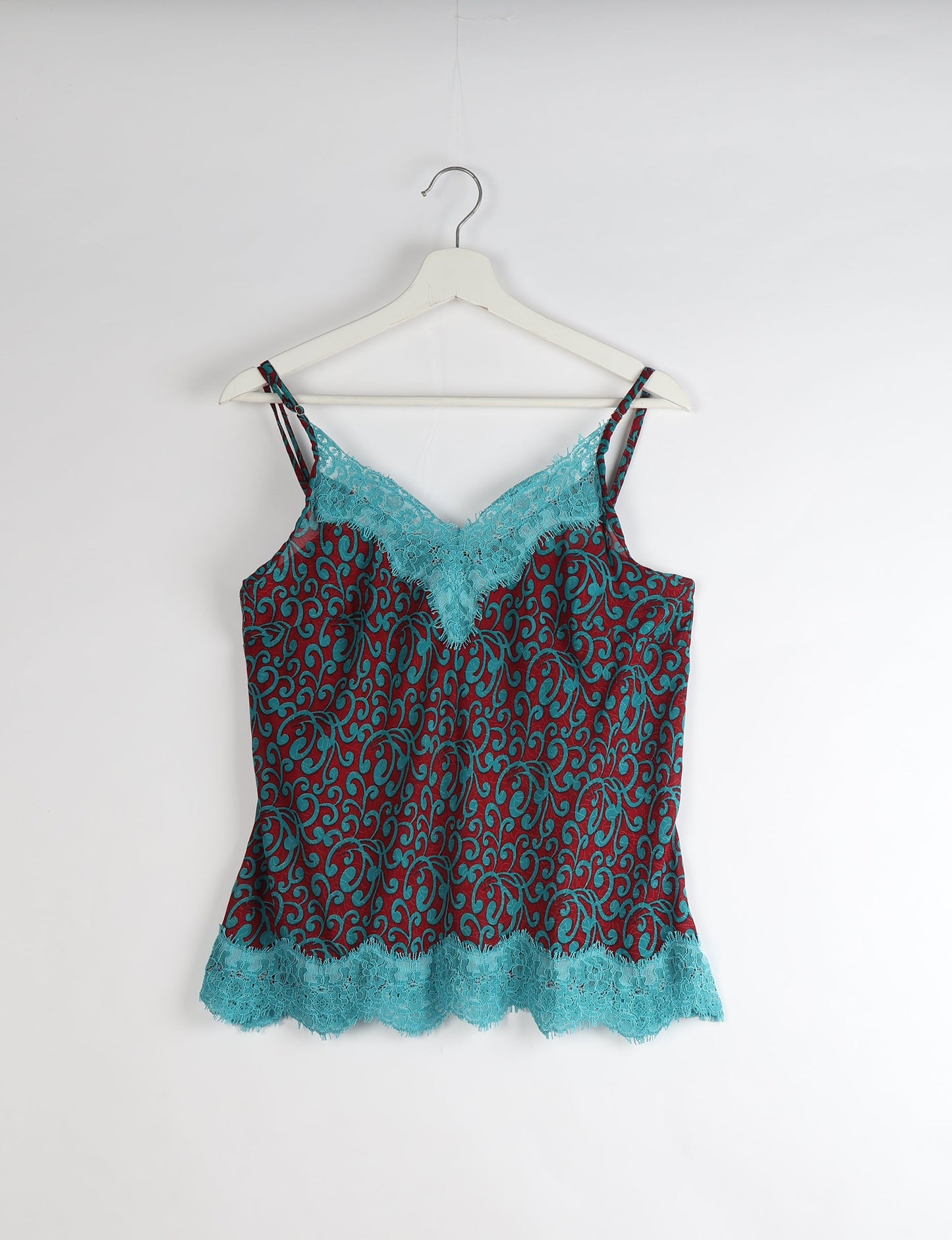 Sleep in eco-friendly luxury with our PJ Set Short. Made for the conscious consumer, these pajamas contribute to zero waste and sustainable practices. The cami top, adorned with delicate eyelash lace and cut on the bias, pairs seamlessly with the comfy shorts featuring an elasticated waist and drawstring tie.