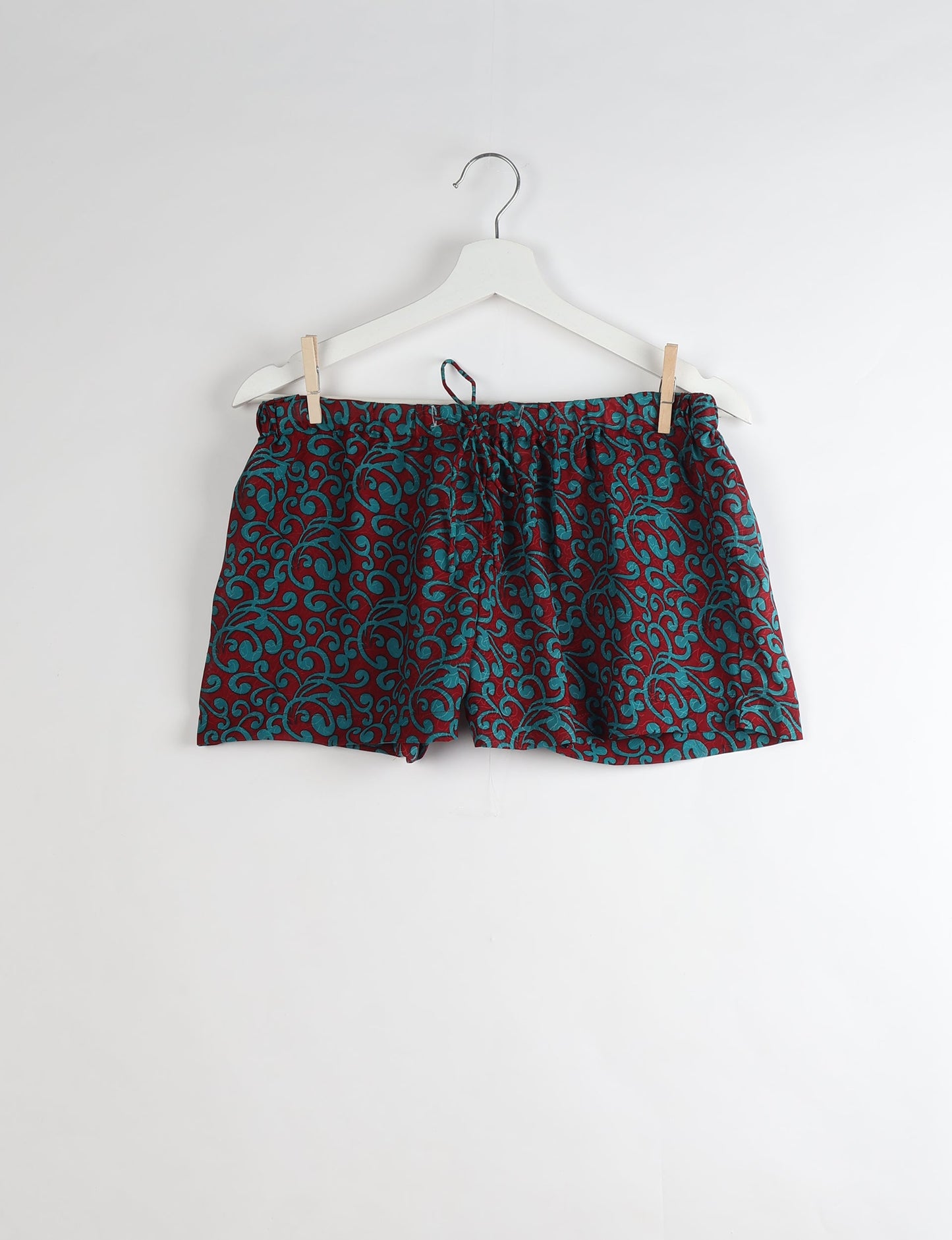 Sleep in eco-friendly luxury with our PJ Set Short. Made for the conscious consumer, these pajamas contribute to zero waste and sustainable practices. The cami top, adorned with delicate eyelash lace and cut on the bias, pairs seamlessly with the comfy shorts featuring an elasticated waist and drawstring tie.