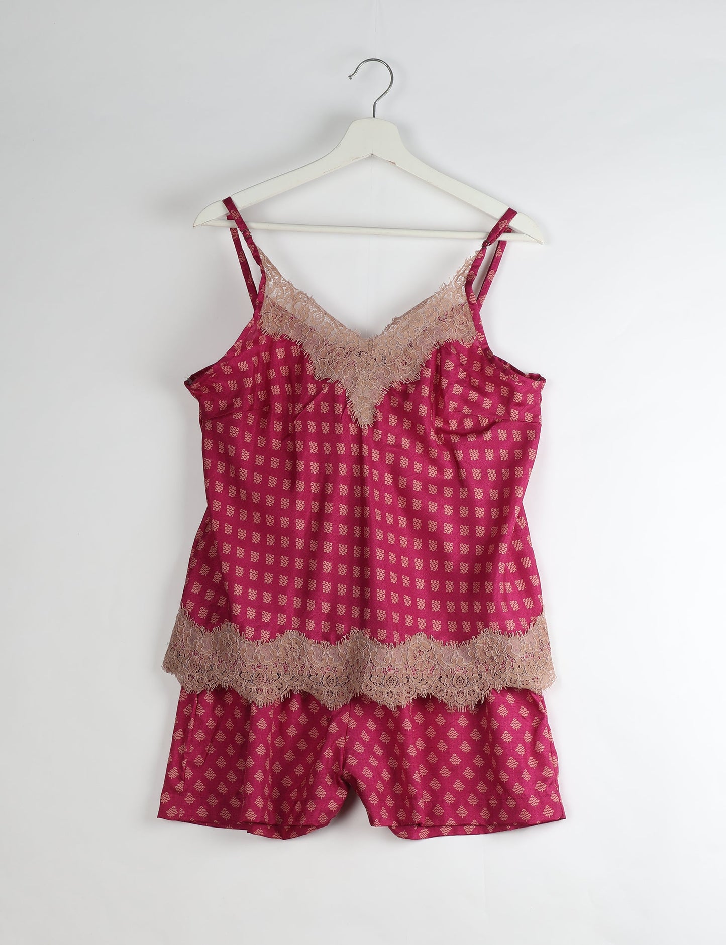 Sleep in eco-friendly luxury with our PJ Set Short. Made for the conscious consumer, these pajamas contribute to zero waste and sustainable practices. The cami top, adorned with delicate eyelash lace and cut on the bias, pairs seamlessly with the comfy shorts featuring an elasticated waist and drawstring tie.