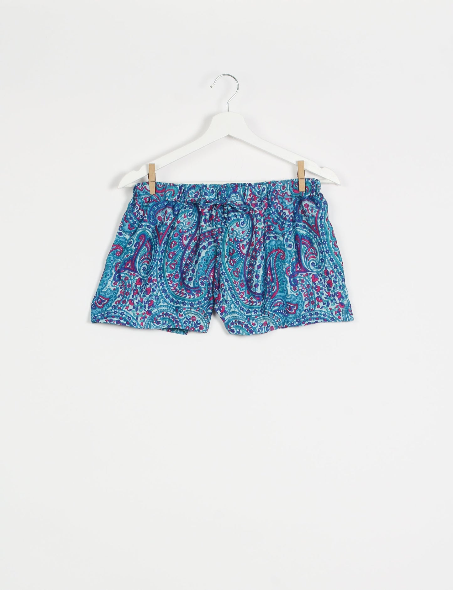 Sleep in eco-friendly luxury with our PJ Set Short. Made for the conscious consumer, these pajamas contribute to zero waste and sustainable practices. The cami top, adorned with delicate eyelash lace and cut on the bias, pairs seamlessly with the comfy shorts featuring an elasticated waist and drawstring tie.