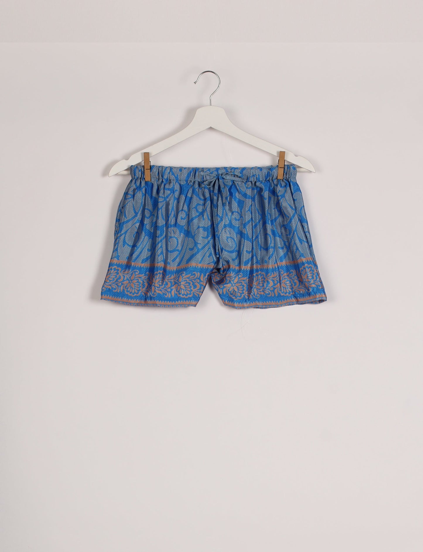 Sleep in eco-friendly luxury with our PJ Set Short. Made for the conscious consumer, these pajamas contribute to zero waste and sustainable practices. The cami top, adorned with delicate eyelash lace and cut on the bias, pairs seamlessly with the comfy shorts featuring an elasticated waist and drawstring tie.