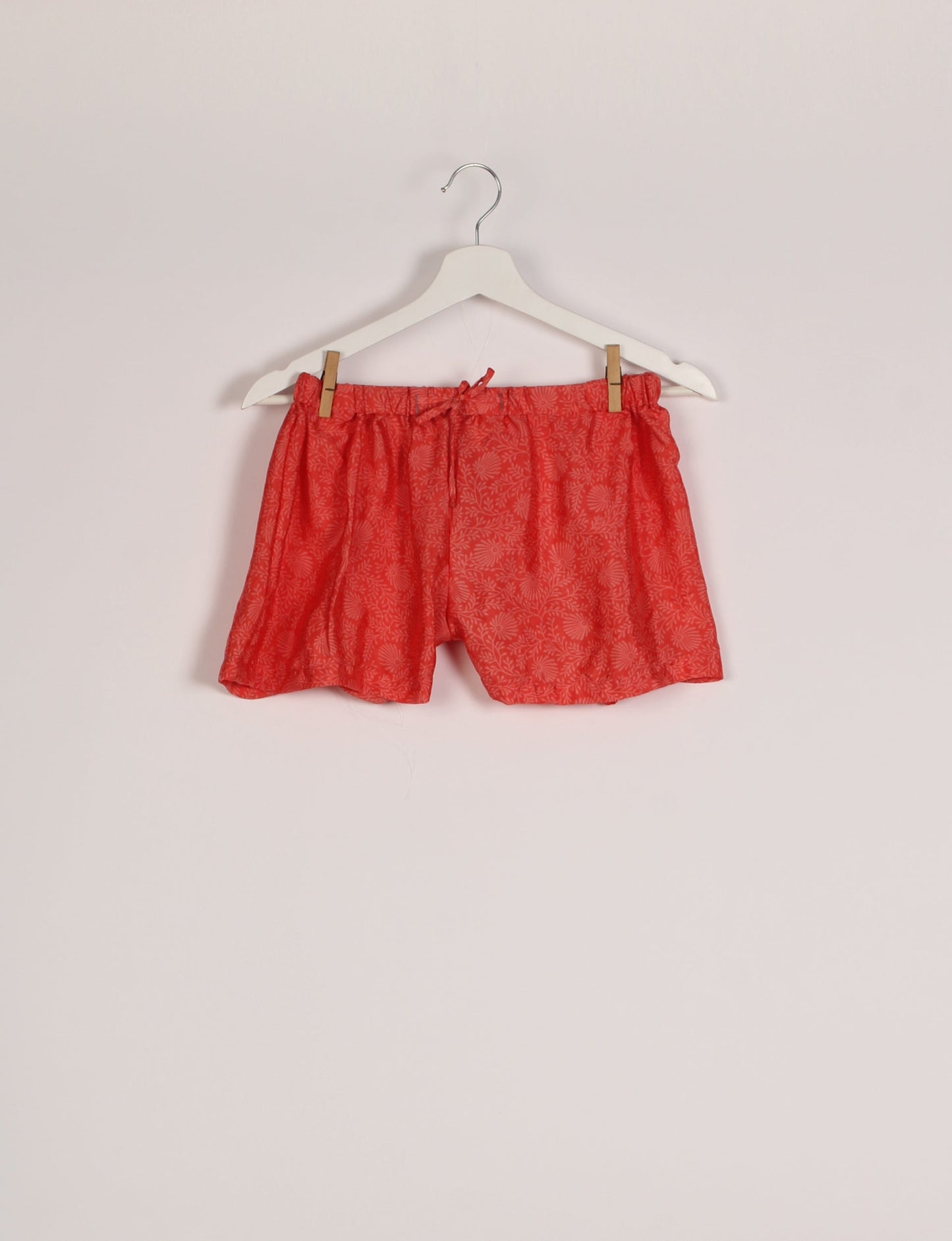 Sleep in eco-friendly luxury with our PJ Set Short. Made for the conscious consumer, these pajamas contribute to zero waste and sustainable practices. The cami top, adorned with delicate eyelash lace and cut on the bias, pairs seamlessly with the comfy shorts featuring an elasticated waist and drawstring tie.