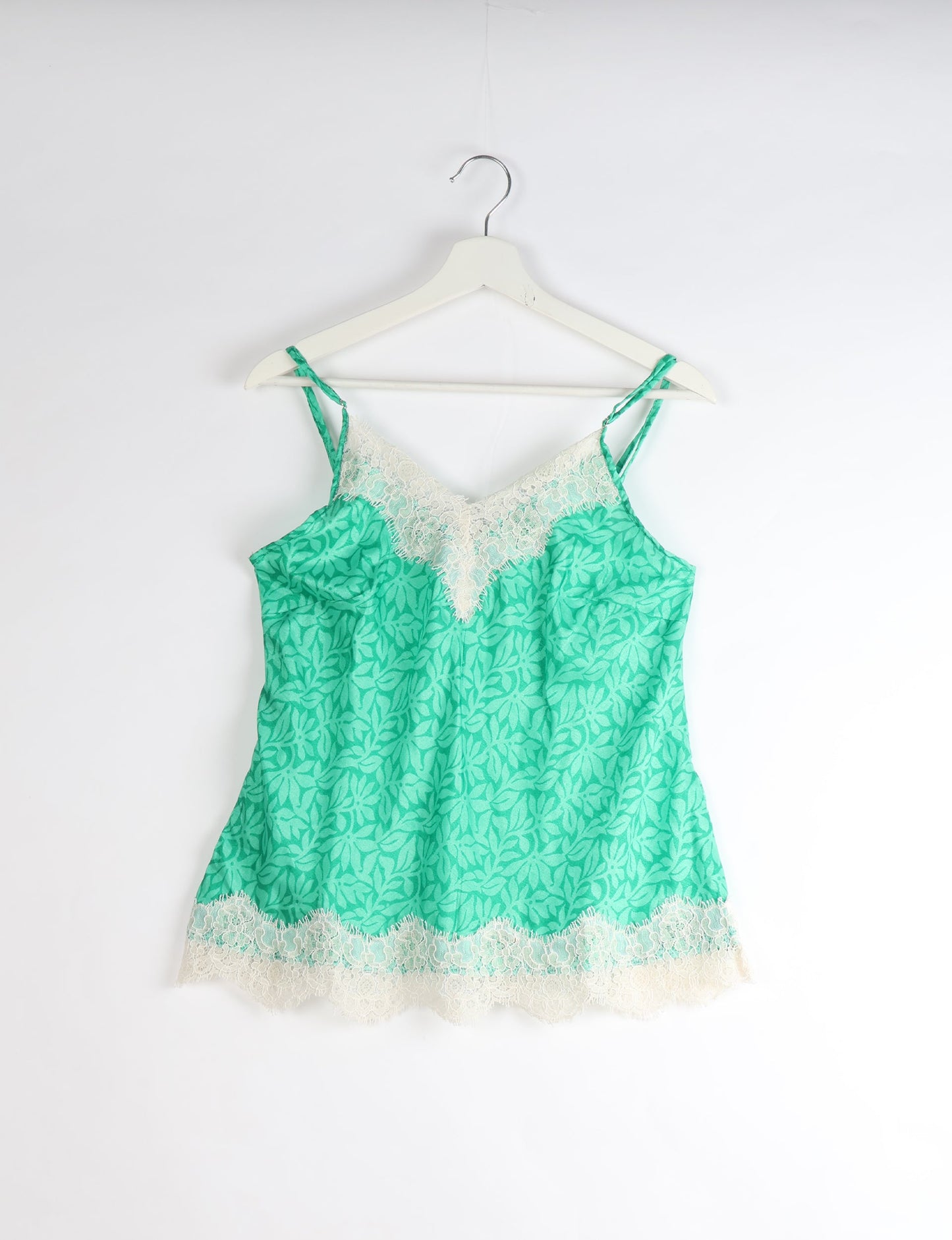 Sleep in eco-friendly luxury with our PJ Set Short. Made for the conscious consumer, these pajamas contribute to zero waste and sustainable practices. The cami top, adorned with delicate eyelash lace and cut on the bias, pairs seamlessly with the comfy shorts featuring an elasticated waist and drawstring tie.