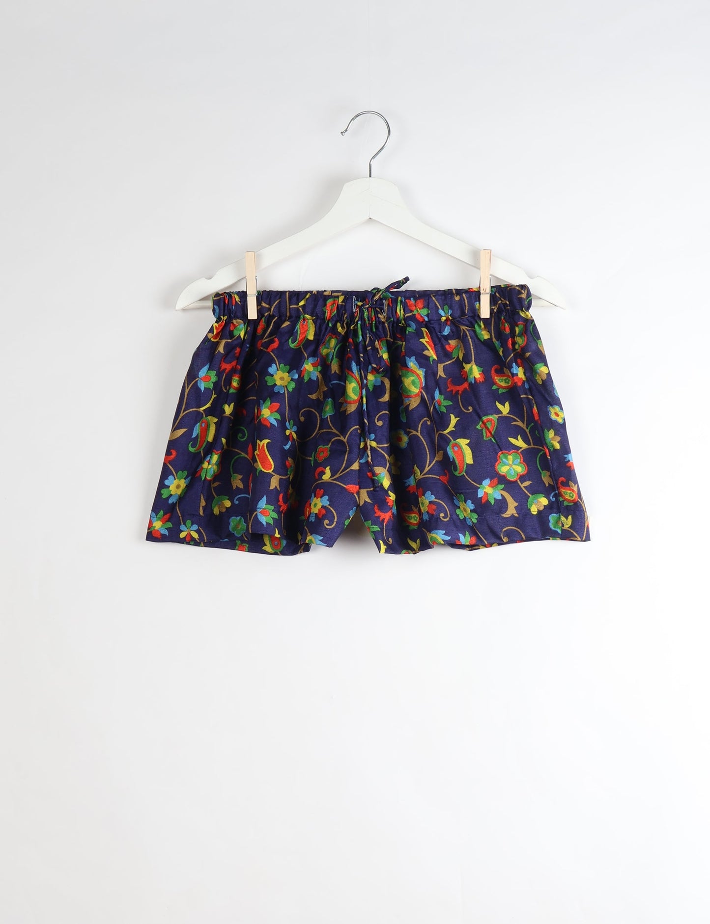 Sleep in eco-friendly luxury with our PJ Set Short. Made for the conscious consumer, these pajamas contribute to zero waste and sustainable practices. The cami top, adorned with delicate eyelash lace and cut on the bias, pairs seamlessly with the comfy shorts featuring an elasticated waist and drawstring tie.