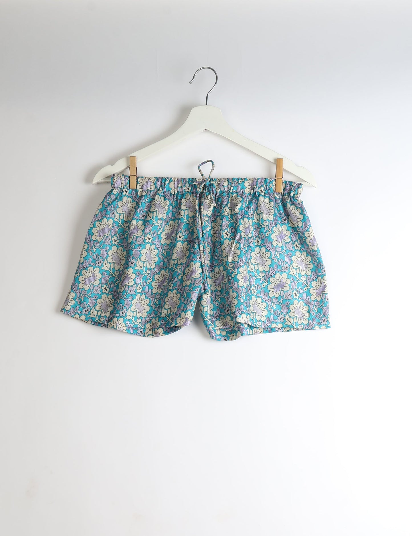 Sleep in eco-friendly luxury with our PJ Set Short. Made for the conscious consumer, these pajamas contribute to zero waste and sustainable practices. The cami top, adorned with delicate eyelash lace and cut on the bias, pairs seamlessly with the comfy shorts featuring an elasticated waist and drawstring tie.