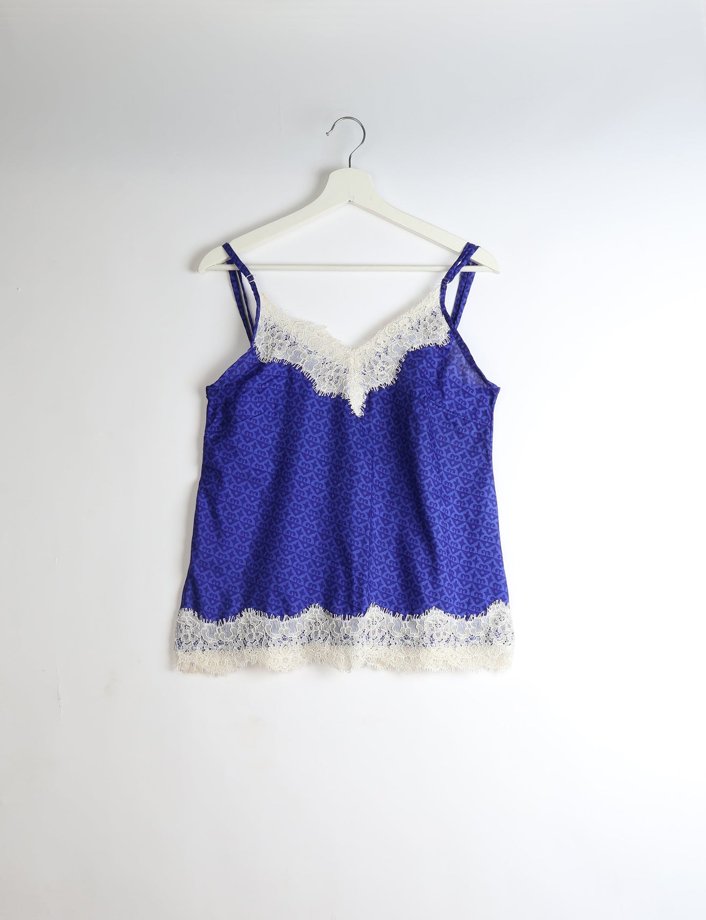 Sleep in eco-friendly luxury with our PJ Set Short. Made for the conscious consumer, these pajamas contribute to zero waste and sustainable practices. The cami top, adorned with delicate eyelash lace and cut on the bias, pairs seamlessly with the comfy shorts featuring an elasticated waist and drawstring tie.