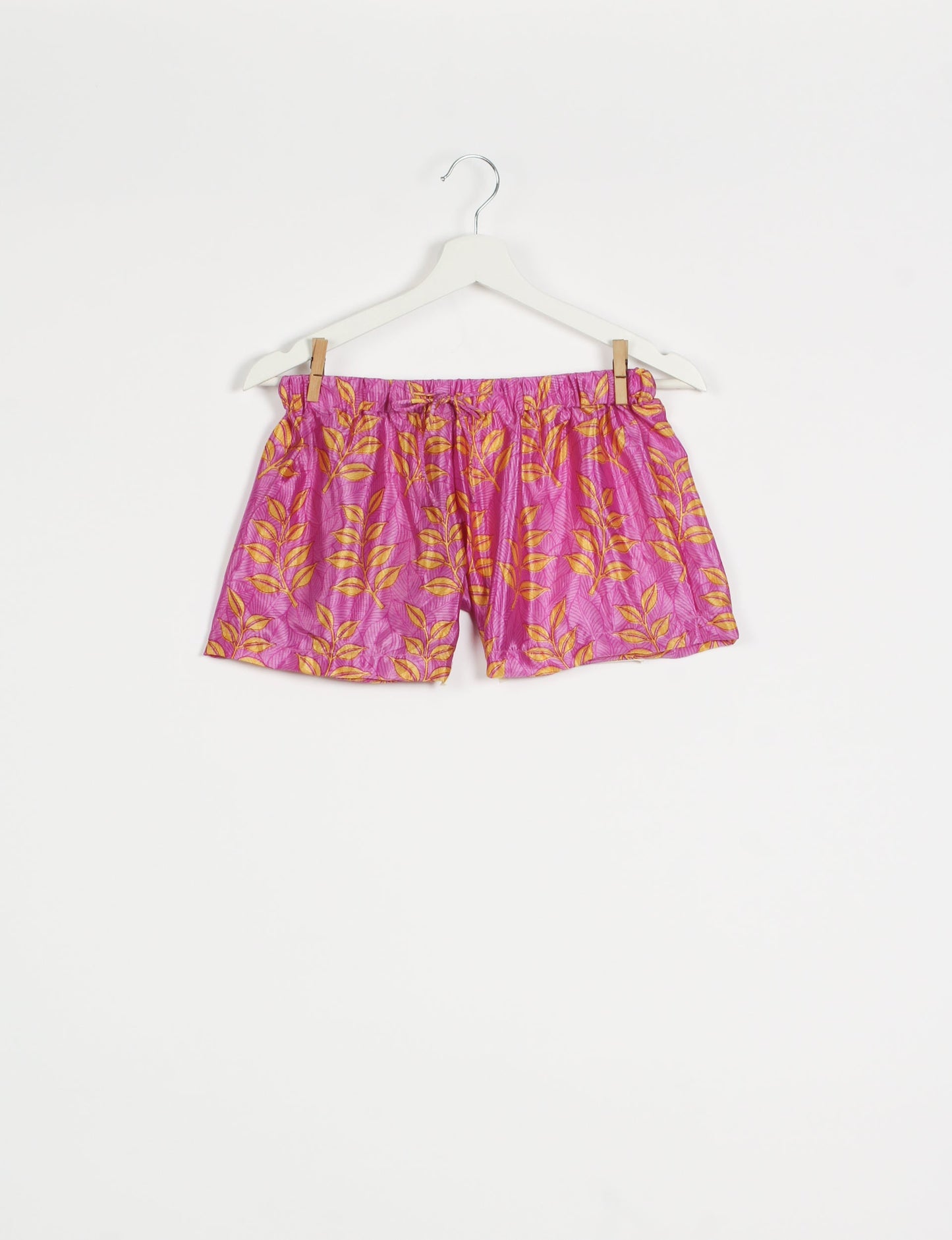 Sleep in eco-friendly luxury with our PJ Set Short. Made for the conscious consumer, these pajamas contribute to zero waste and sustainable practices. The cami top, adorned with delicate eyelash lace and cut on the bias, pairs seamlessly with the comfy shorts featuring an elasticated waist and drawstring tie.