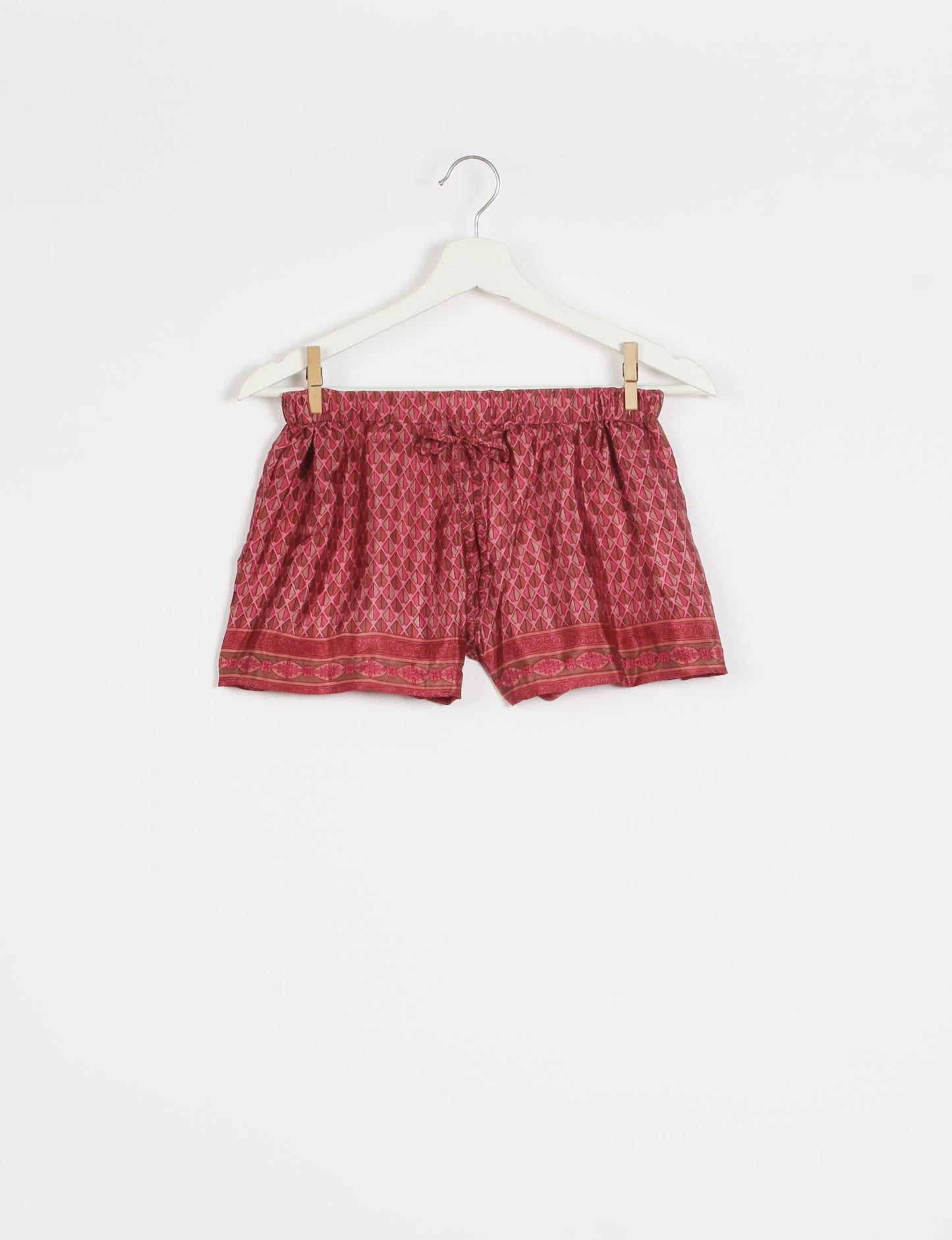 Sleep in eco-friendly luxury with our PJ Set Short. Made for the conscious consumer, these pajamas contribute to zero waste and sustainable practices. The cami top, adorned with delicate eyelash lace and cut on the bias, pairs seamlessly with the comfy shorts featuring an elasticated waist and drawstring tie.