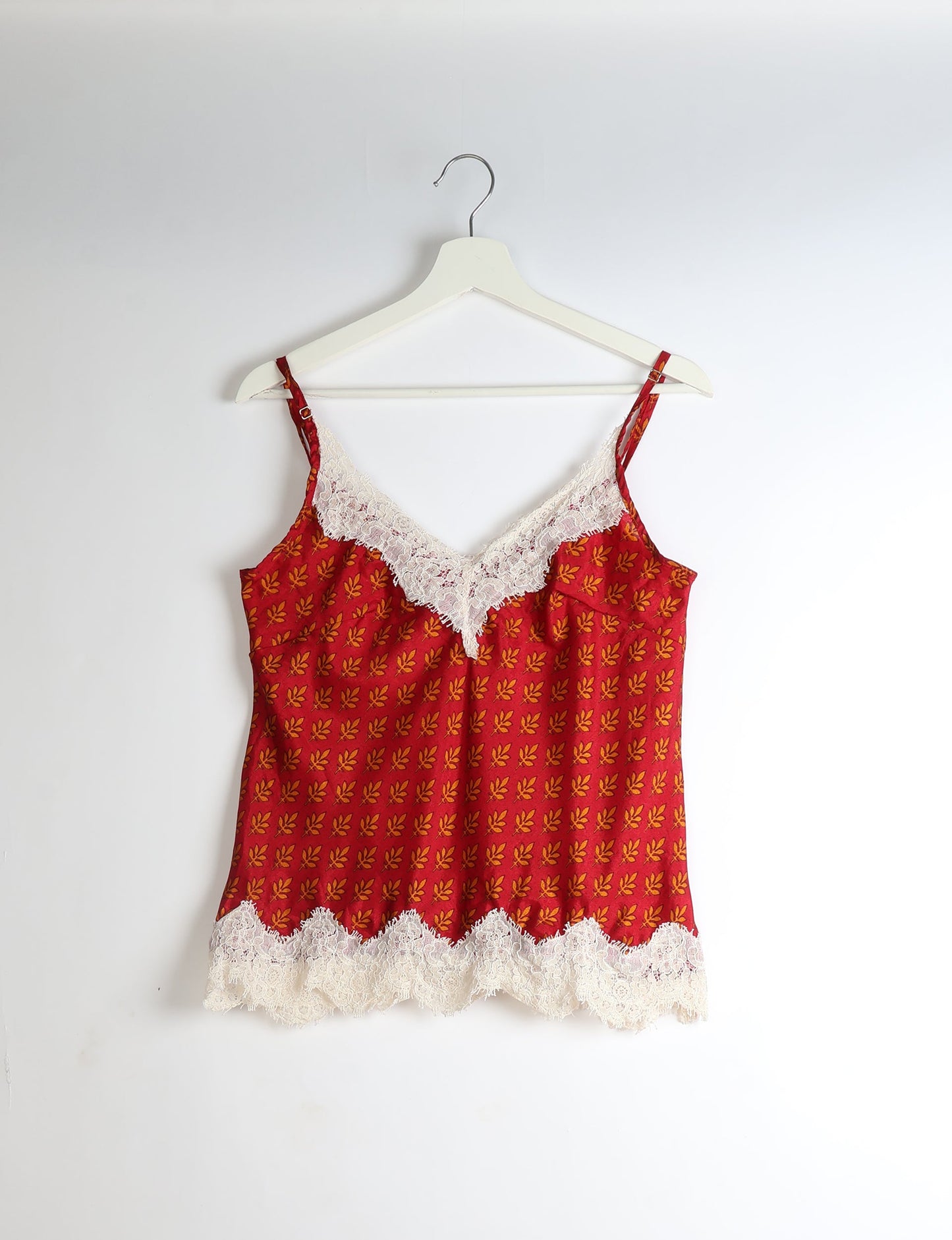 Sleep in eco-friendly luxury with our PJ Set Short. Made for the conscious consumer, these pajamas contribute to zero waste and sustainable practices. The cami top, adorned with delicate eyelash lace and cut on the bias, pairs seamlessly with the comfy shorts featuring an elasticated waist and drawstring tie.