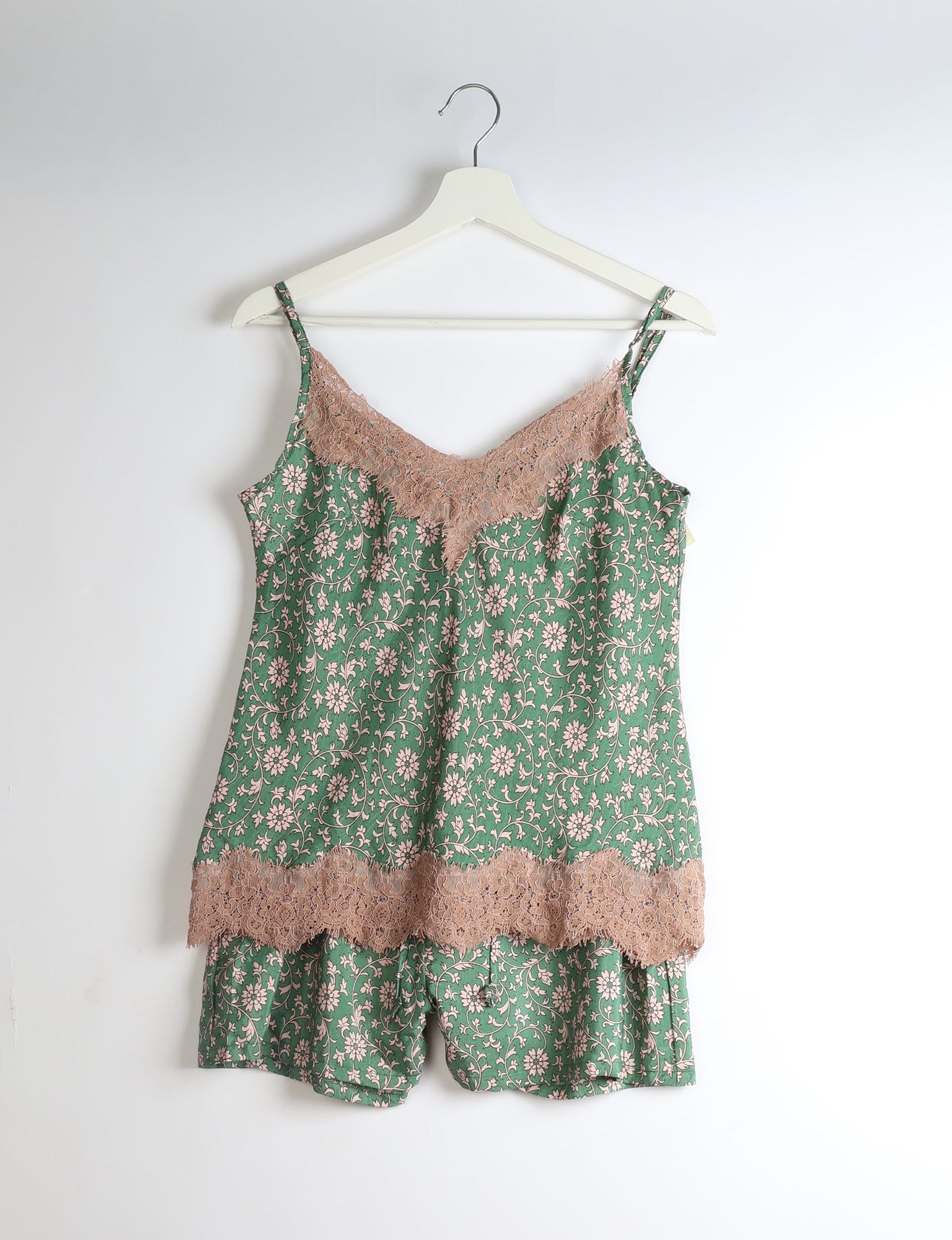 Sleep in eco-friendly luxury with our PJ Set Short. Made for the conscious consumer, these pajamas contribute to zero waste and sustainable practices. The cami top, adorned with delicate eyelash lace and cut on the bias, pairs seamlessly with the comfy shorts featuring an elasticated waist and drawstring tie.