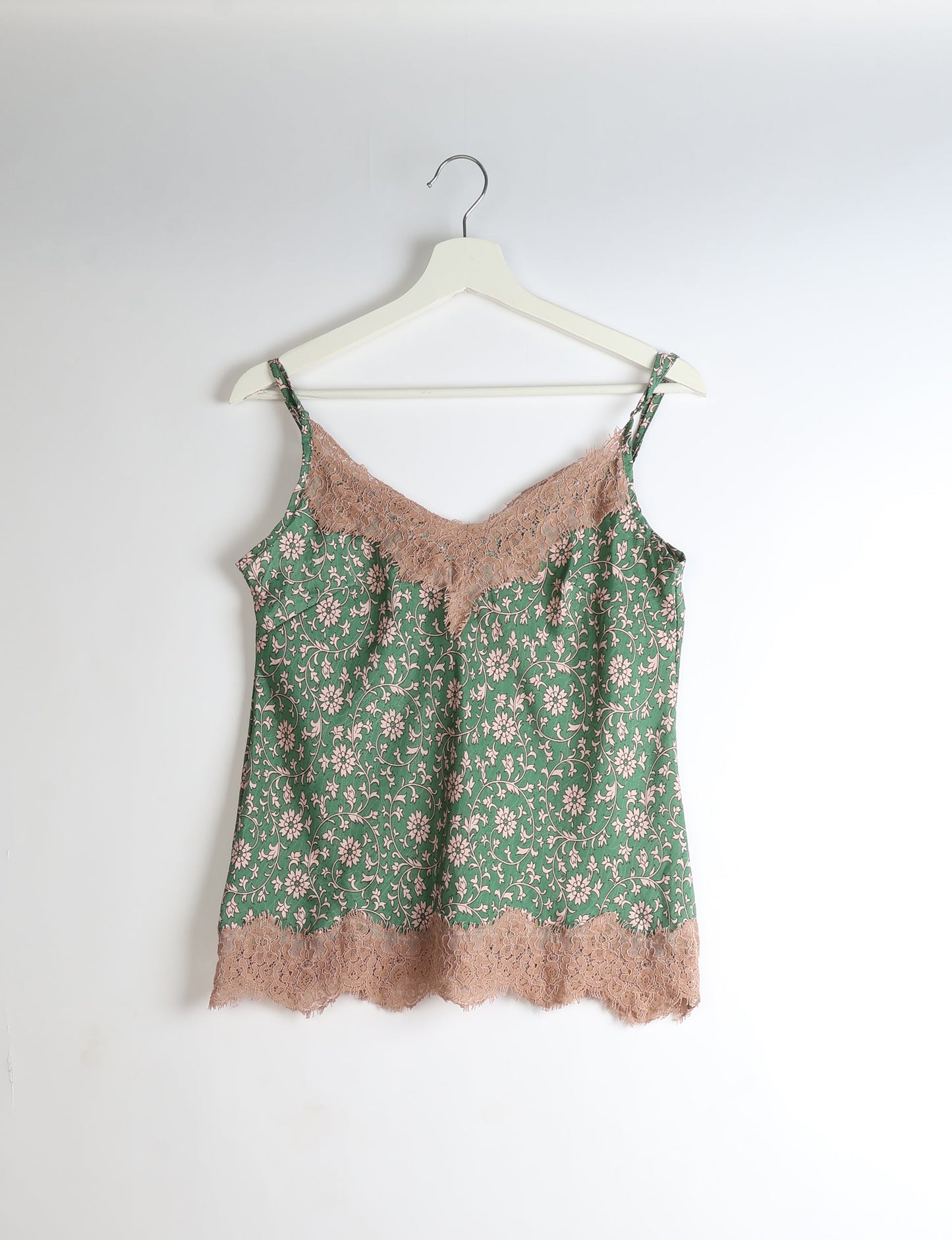 Sleep in eco-friendly luxury with our PJ Set Short. Made for the conscious consumer, these pajamas contribute to zero waste and sustainable practices. The cami top, adorned with delicate eyelash lace and cut on the bias, pairs seamlessly with the comfy shorts featuring an elasticated waist and drawstring tie.