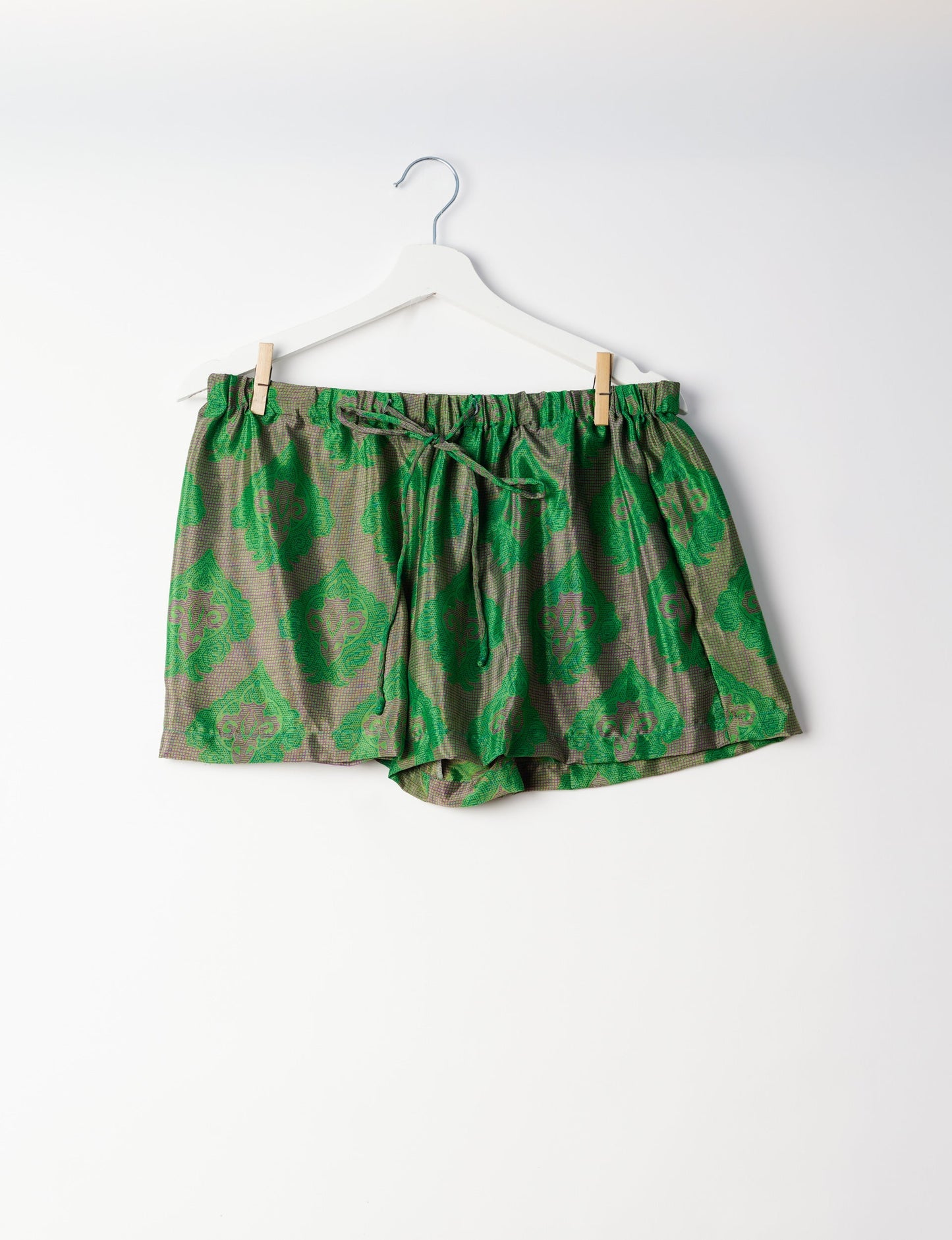 Sleep in eco-friendly luxury with our PJ Set Short. Made for the conscious consumer, these pajamas contribute to zero waste and sustainable practices. The cami top, adorned with delicate eyelash lace and cut on the bias, pairs seamlessly with the comfy shorts featuring an elasticated waist and drawstring tie.