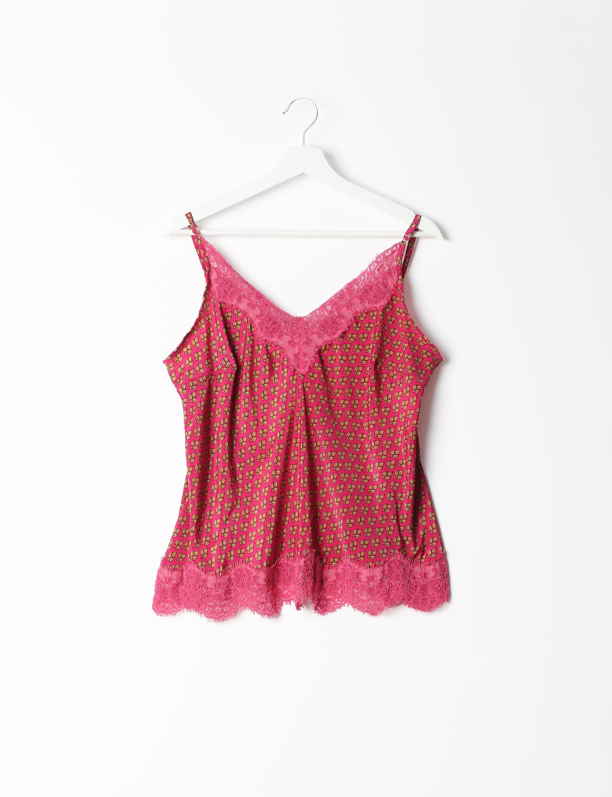 Sleep in eco-friendly luxury with our PJ Set Short. Made for the conscious consumer, these pajamas contribute to zero waste and sustainable practices. The cami top, adorned with delicate eyelash lace and cut on the bias, pairs seamlessly with the comfy shorts featuring an elasticated waist and drawstring tie.