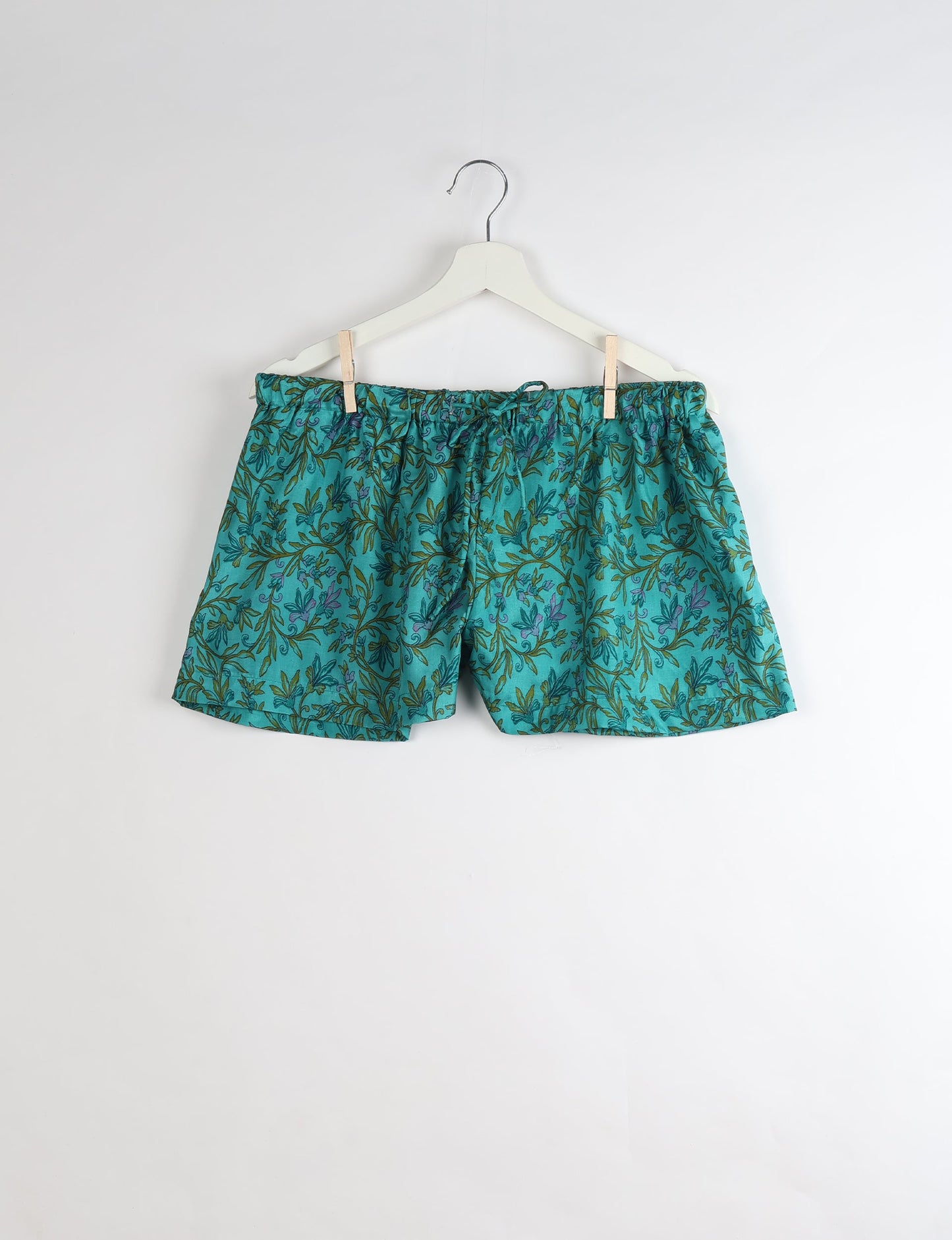 Sleep in eco-friendly luxury with our PJ Set Short. Made for the conscious consumer, these pajamas contribute to zero waste and sustainable practices. The cami top, adorned with delicate eyelash lace and cut on the bias, pairs seamlessly with the comfy shorts featuring an elasticated waist and drawstring tie.