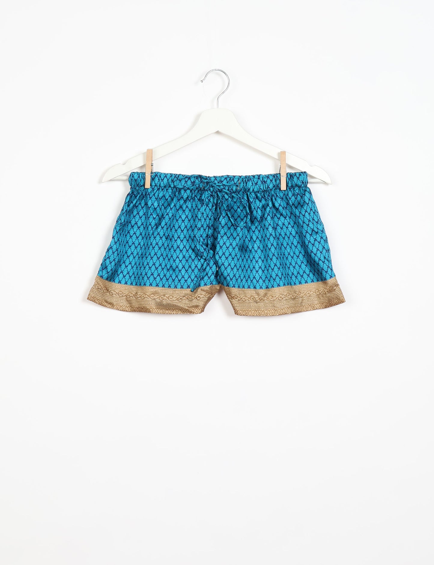 Sleep in eco-friendly luxury with our PJ Set Short. Made for the conscious consumer, these pajamas contribute to zero waste and sustainable practices. The cami top, adorned with delicate eyelash lace and cut on the bias, pairs seamlessly with the comfy shorts featuring an elasticated waist and drawstring tie.