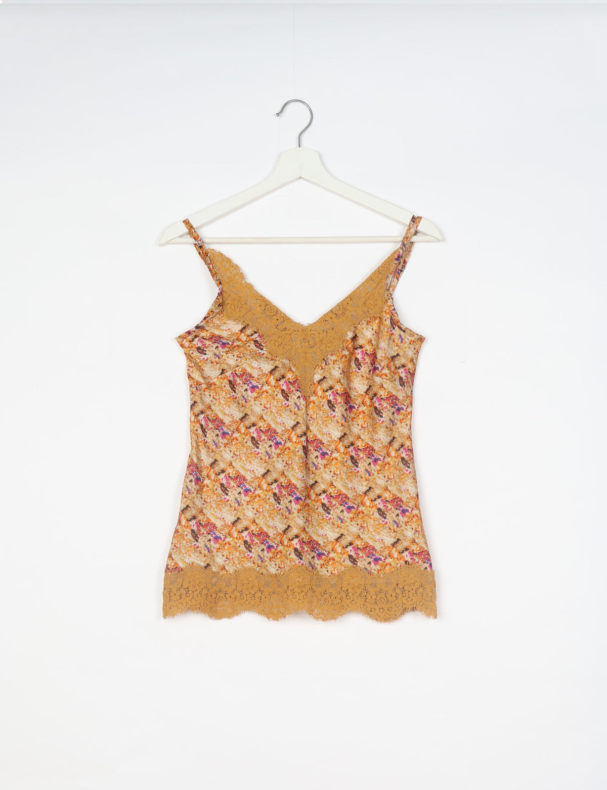Sleep in eco-friendly luxury with our PJ Set Short. Made for the conscious consumer, these pajamas contribute to zero waste and sustainable practices. The cami top, adorned with delicate eyelash lace and cut on the bias, pairs seamlessly with the comfy shorts featuring an elasticated waist and drawstring tie.