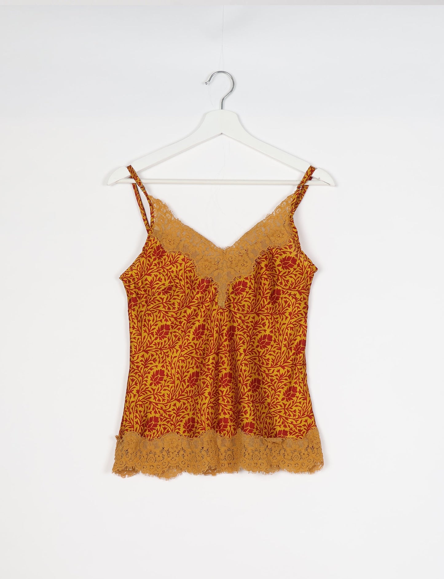 Sleep in eco-friendly luxury with our PJ Set Short. Made for the conscious consumer, these pajamas contribute to zero waste and sustainable practices. The cami top, adorned with delicate eyelash lace and cut on the bias, pairs seamlessly with the comfy shorts featuring an elasticated waist and drawstring tie.